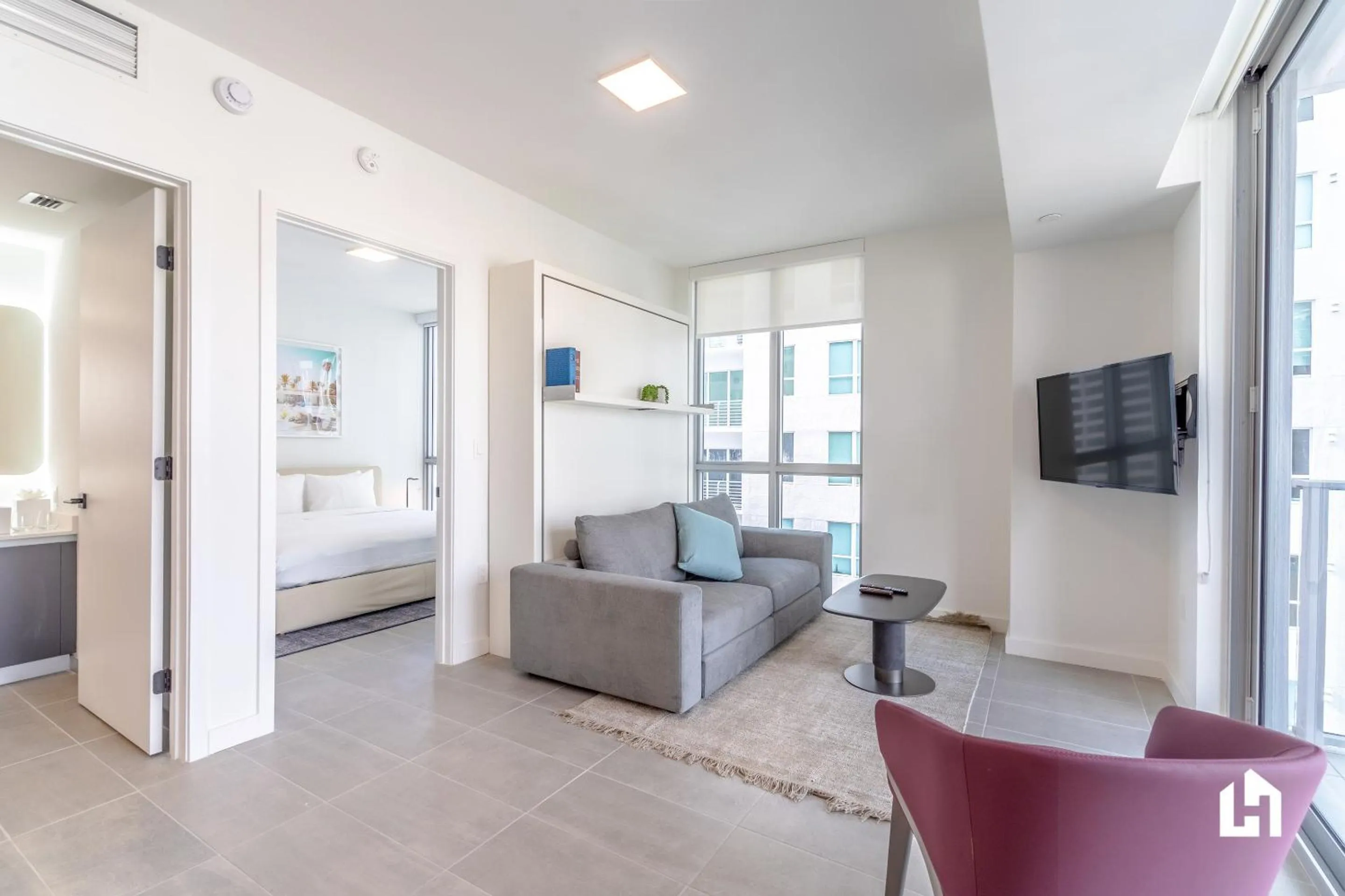 TV and multimedia, Bed in Downtown Miami Condos by Lua Host