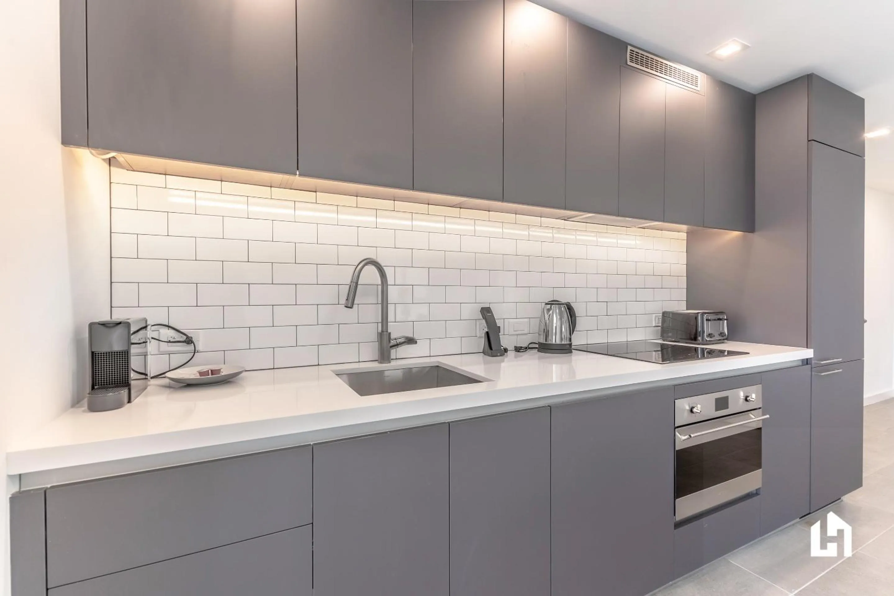 Kitchen or kitchenette in Downtown Miami Condos by Lua Host