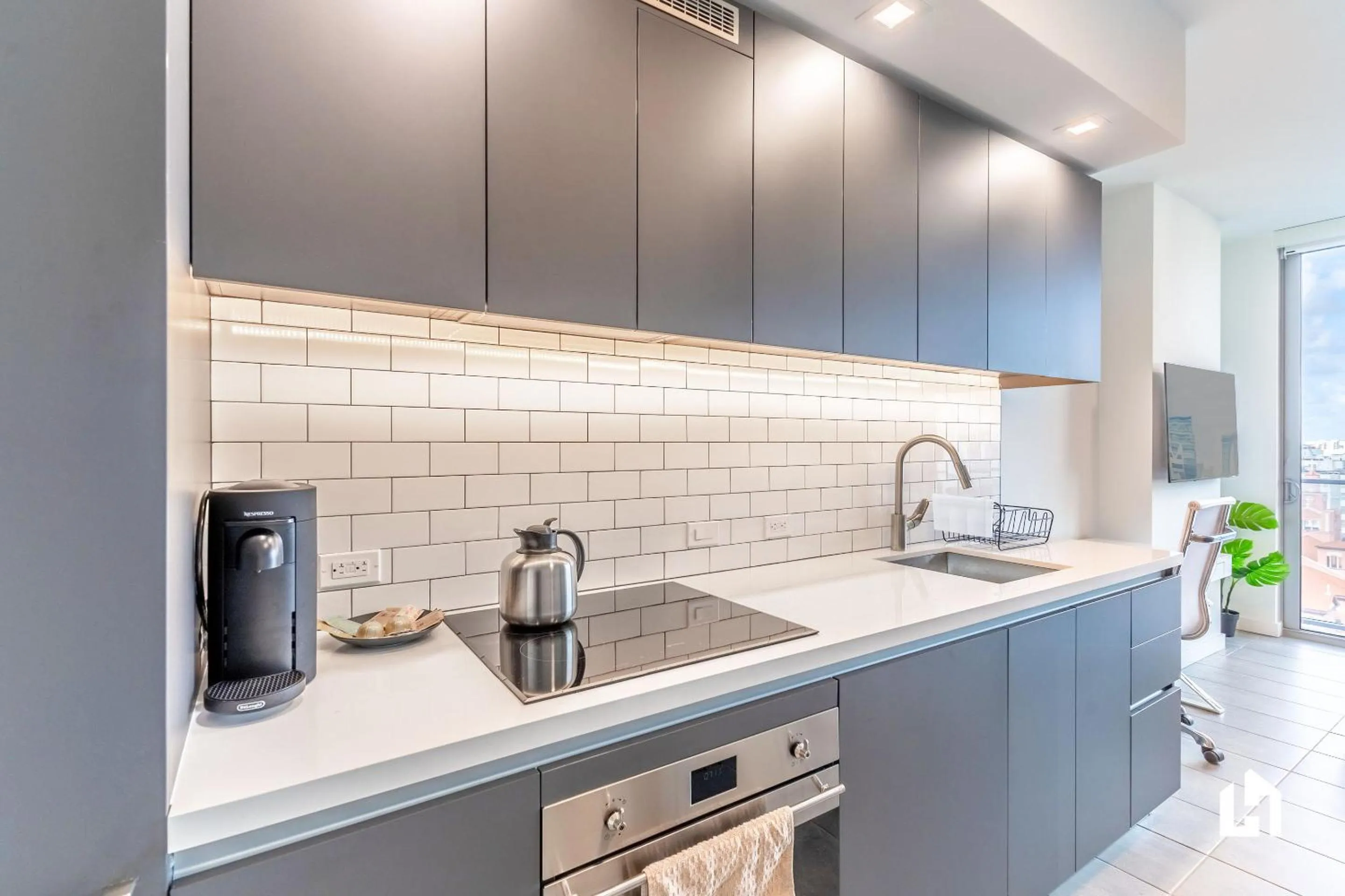 Kitchen or kitchenette in Downtown Miami Condos by Lua Host