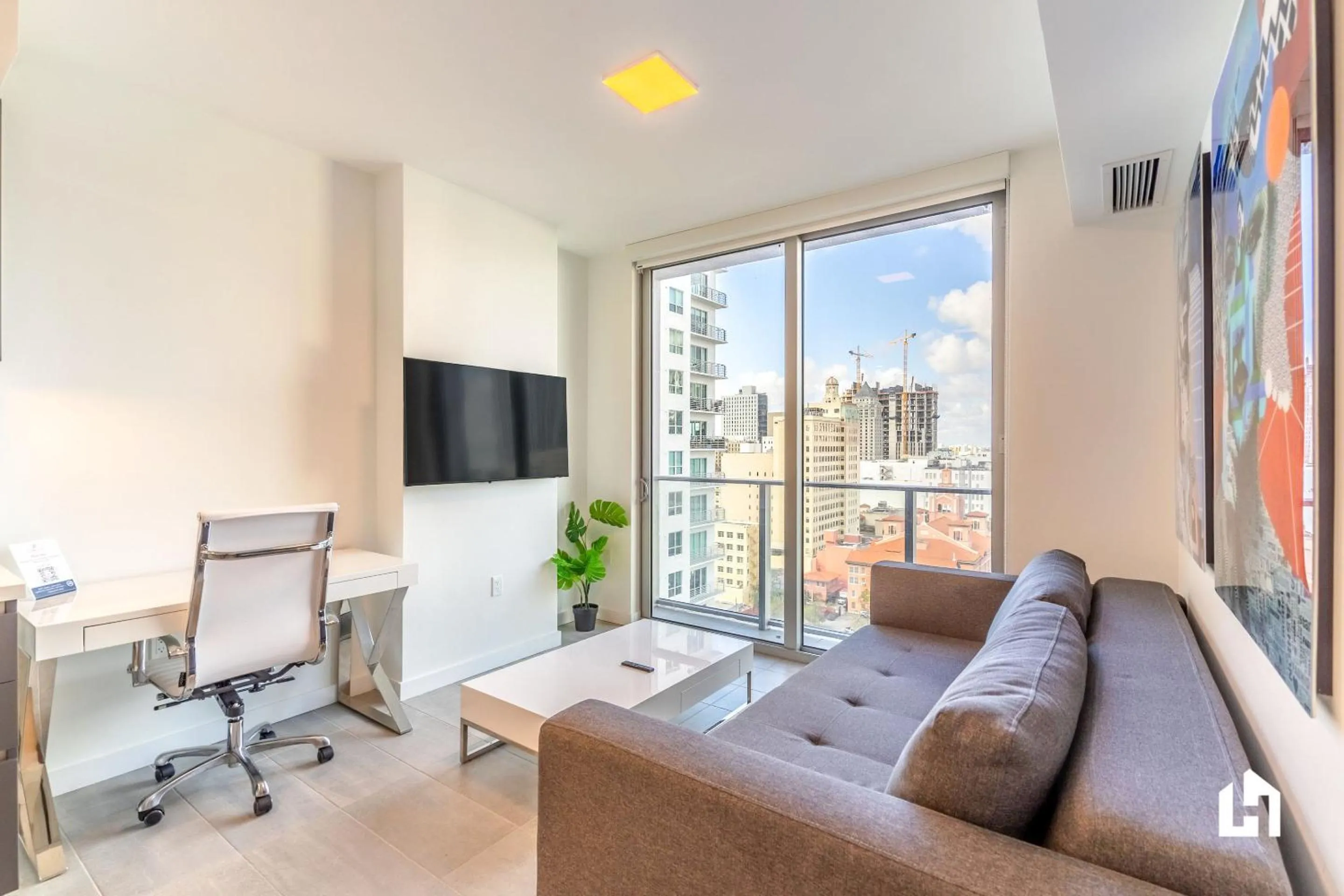 TV and multimedia in Downtown Miami Condos by Lua Host