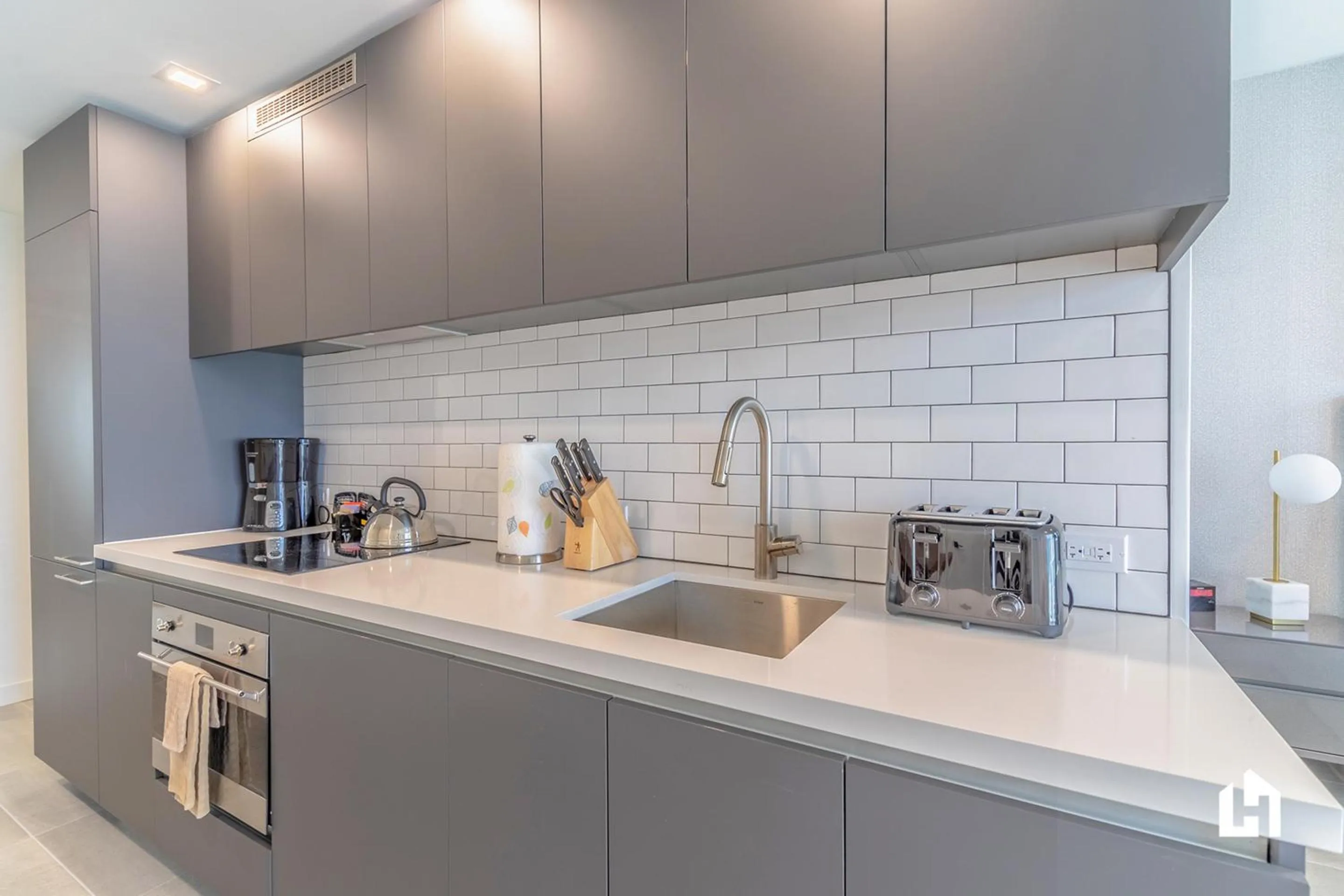 Kitchen or kitchenette in Downtown Miami Condos by Lua Host