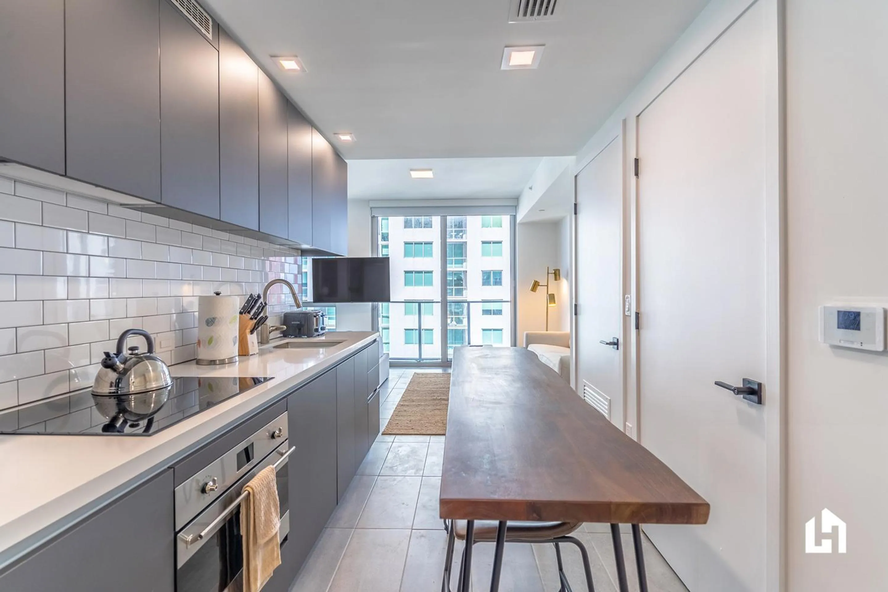 Kitchen or kitchenette in Downtown Miami Condos by Lua Host