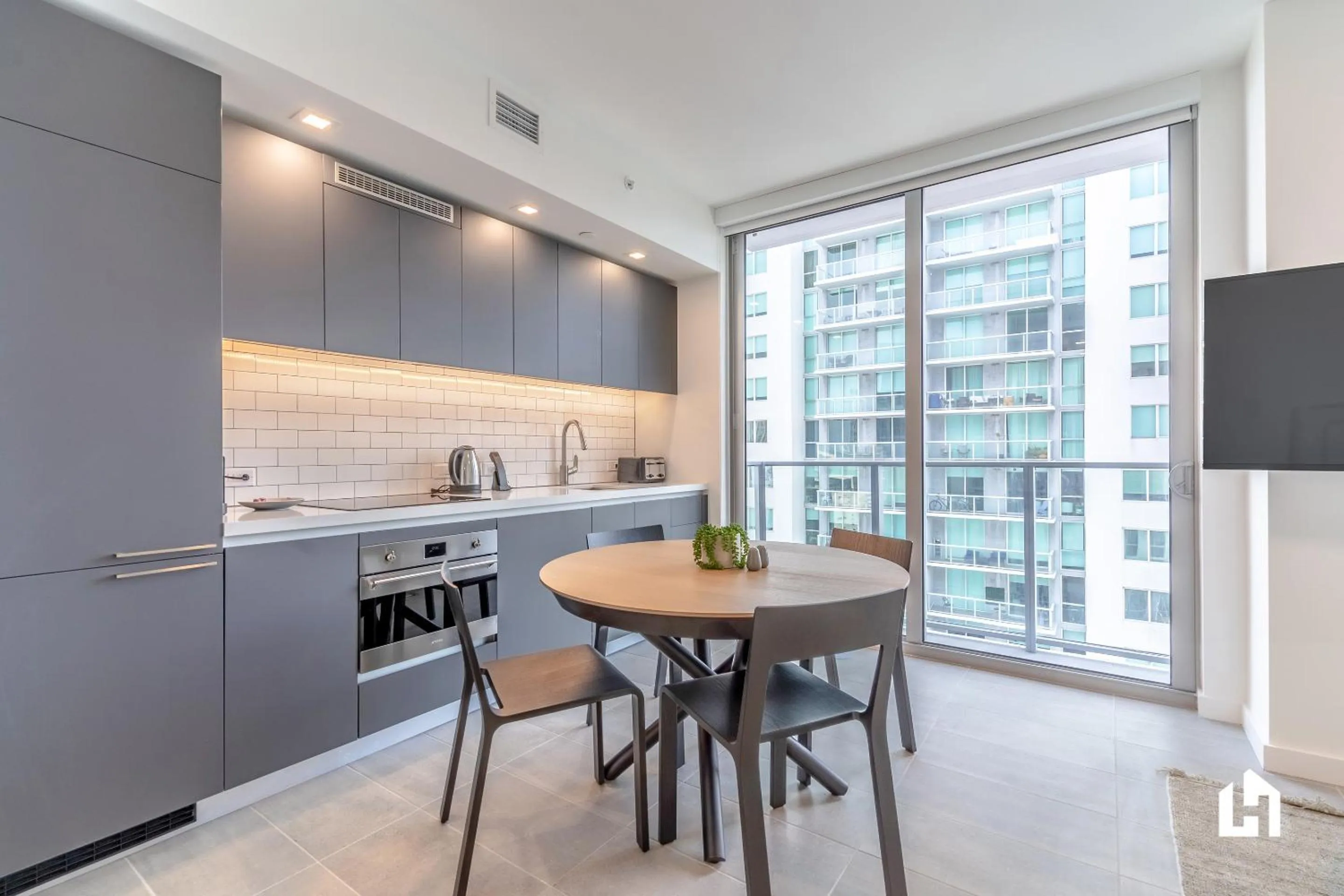 Kitchen or kitchenette in Downtown Miami Condos by Lua Host