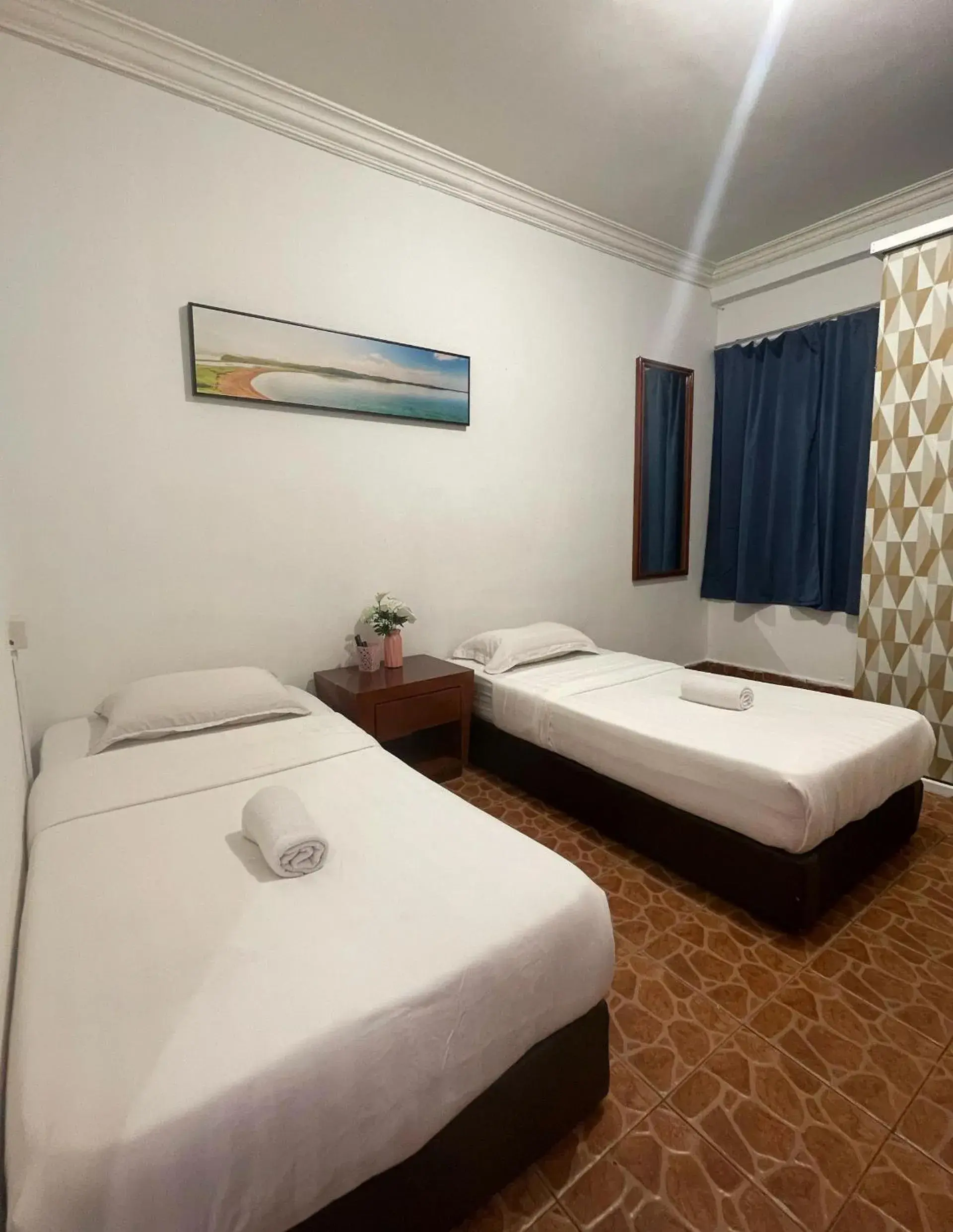 Twin Room with Private Bathroom in Warisan Family inn @ Seafront Twin Room with Private Bathroom in Warisan Family inn @ Seafront