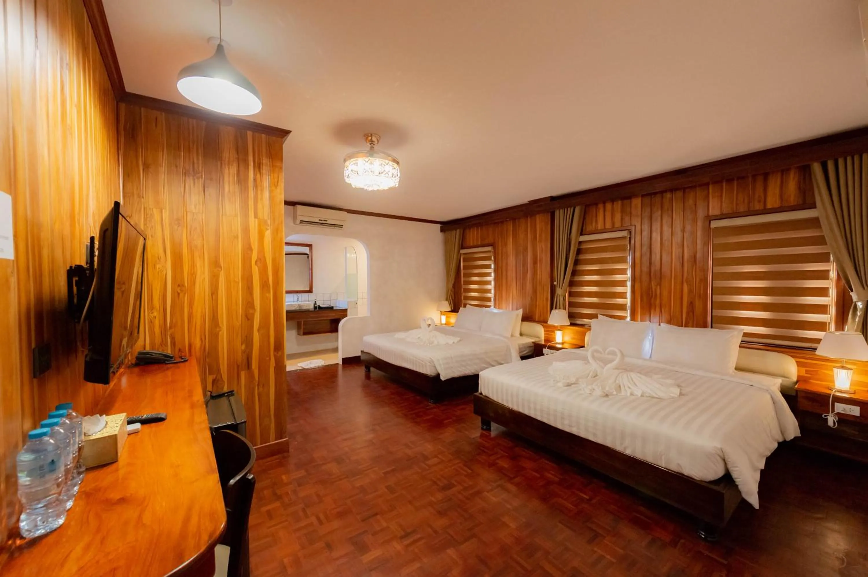 Photo of the whole room, Bed in LuangPrabang Center Hotel