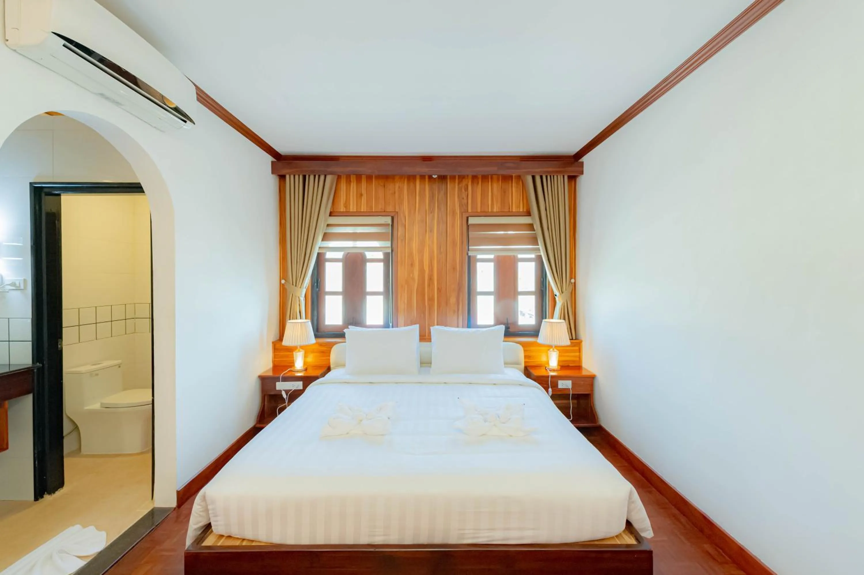 Photo of the whole room, Bed in LuangPrabang Center Hotel