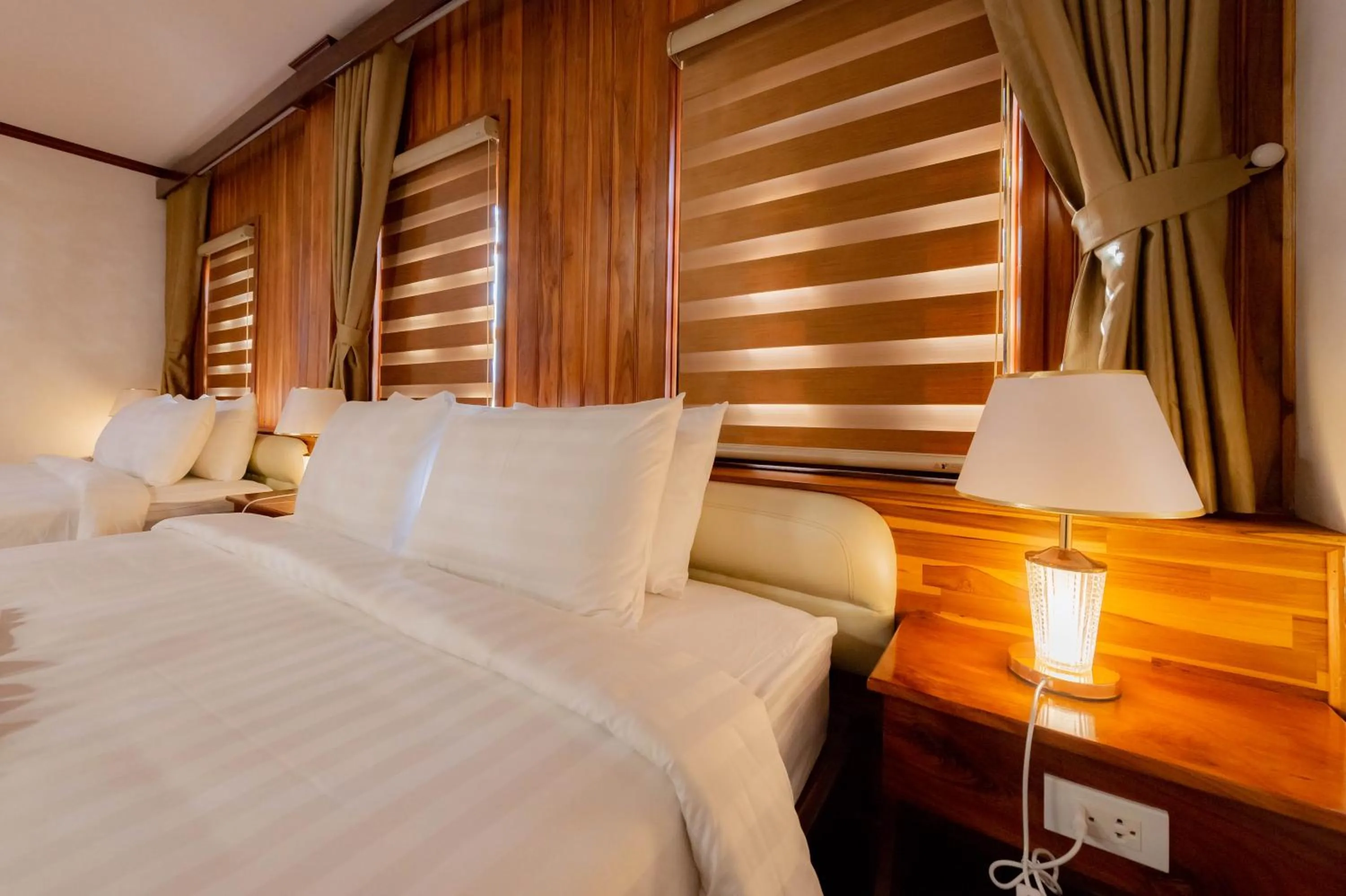 Bed in LuangPrabang Center Hotel