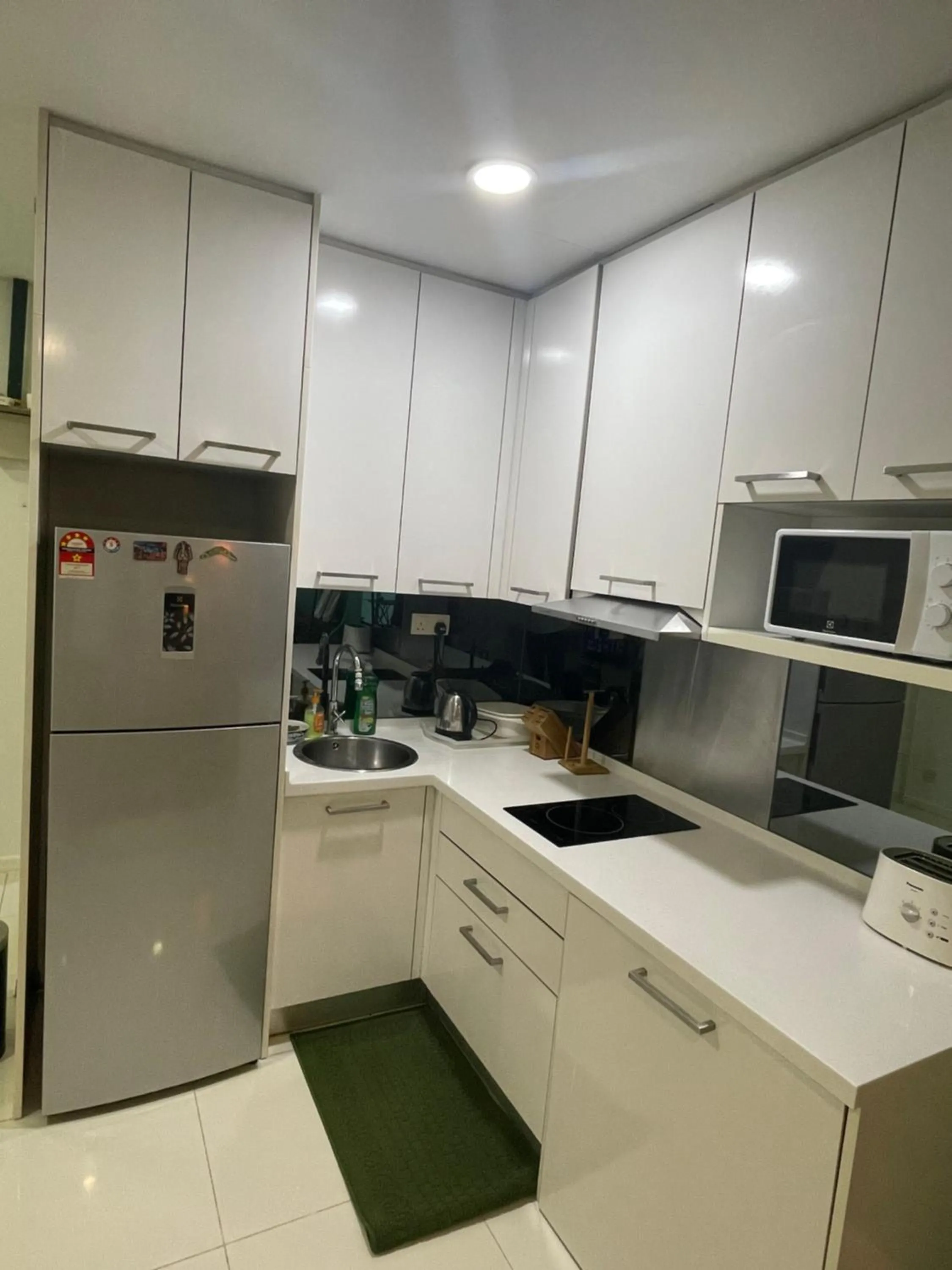 Kitchen or kitchenette in Mercu Summer Suite KLCC by Kuminshu