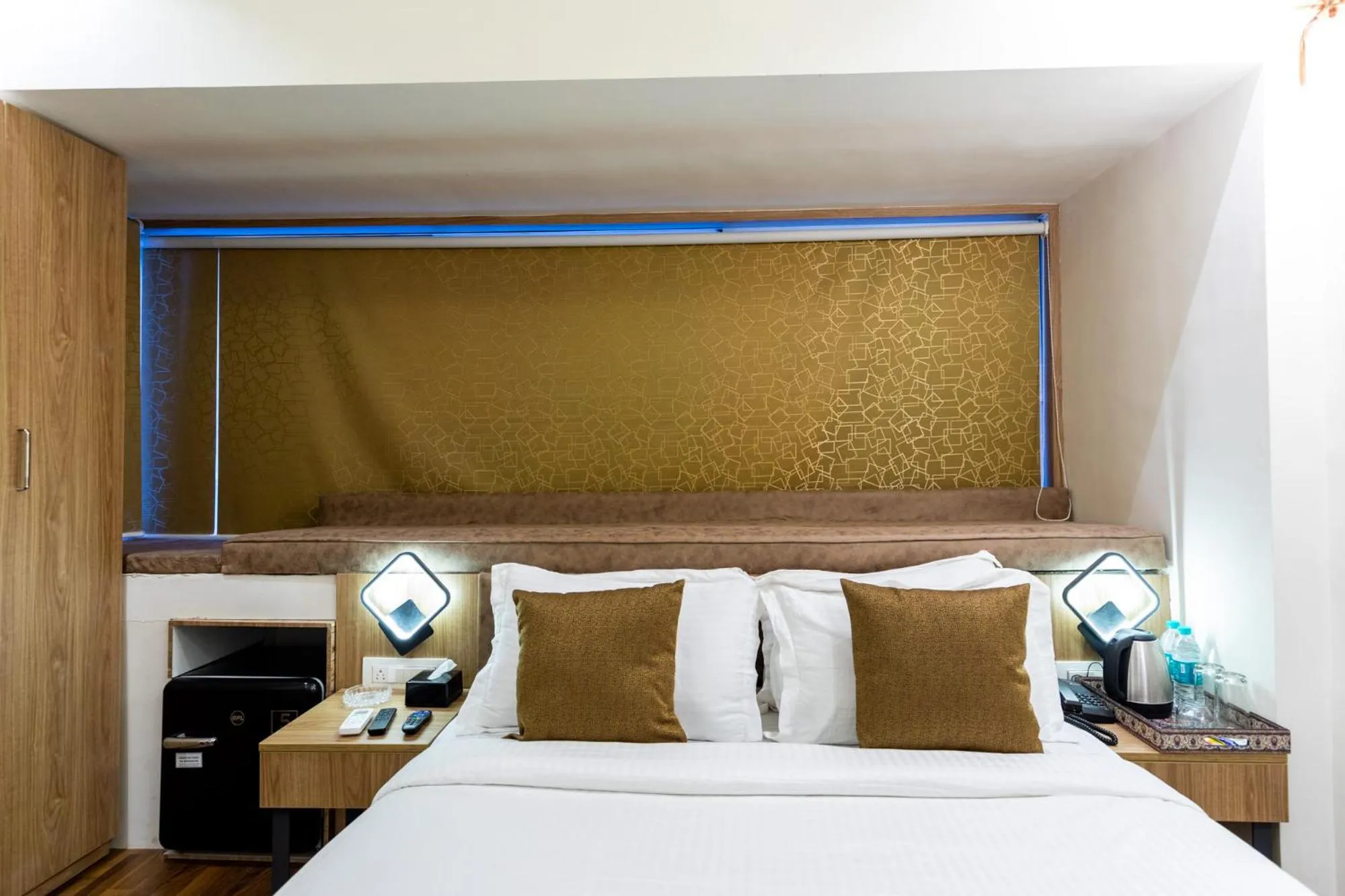 Bed in Hotel Larmont Luxury