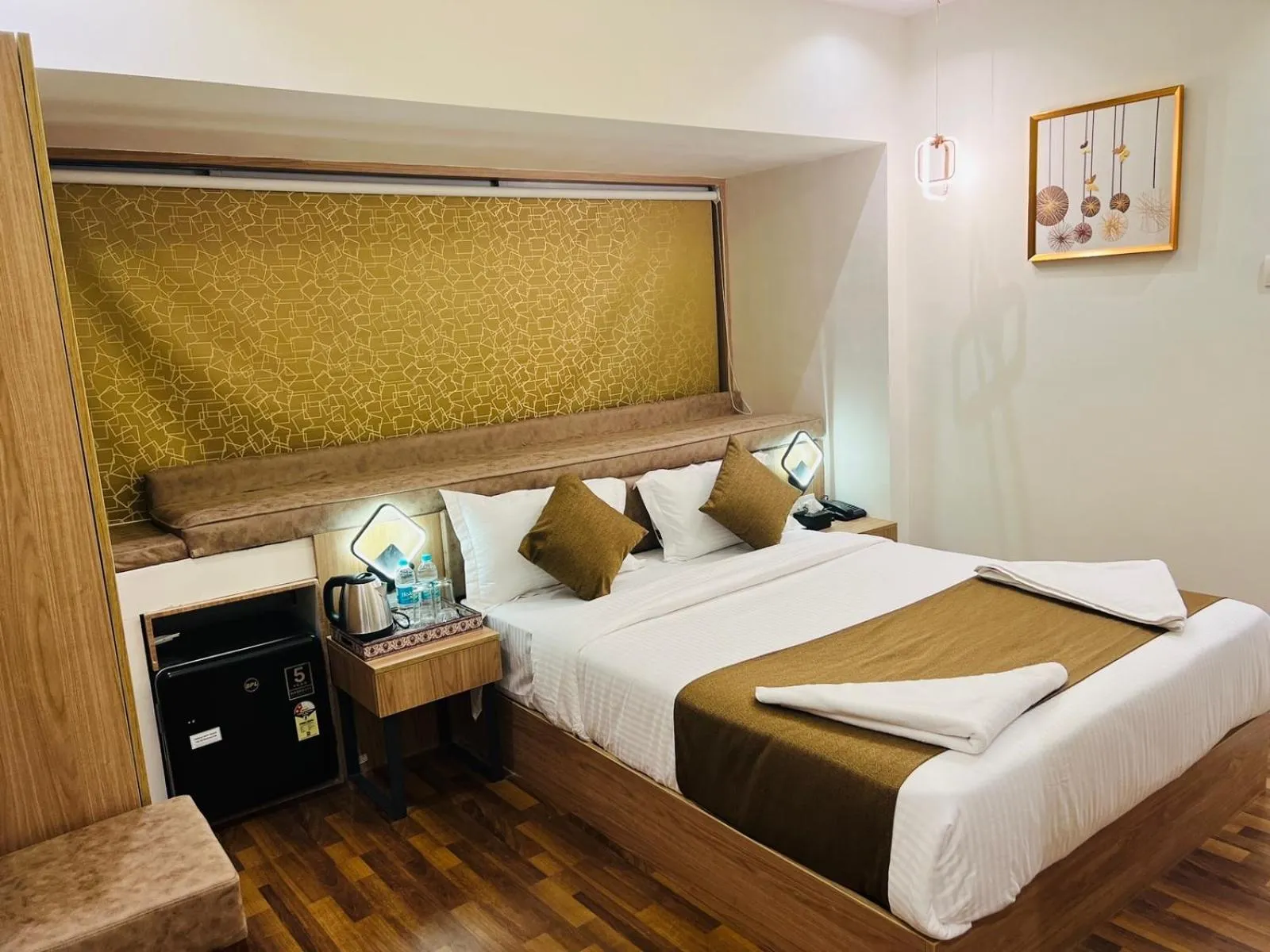 Bed in Hotel Larmont Luxury