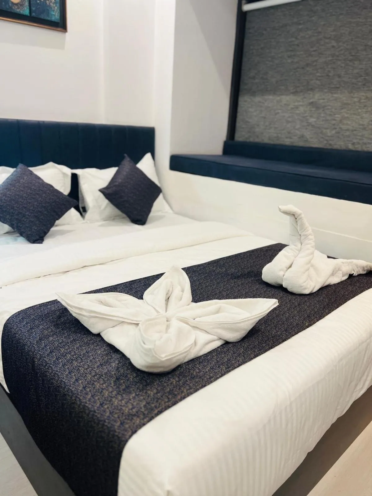 Bed in Hotel Larmont Luxury