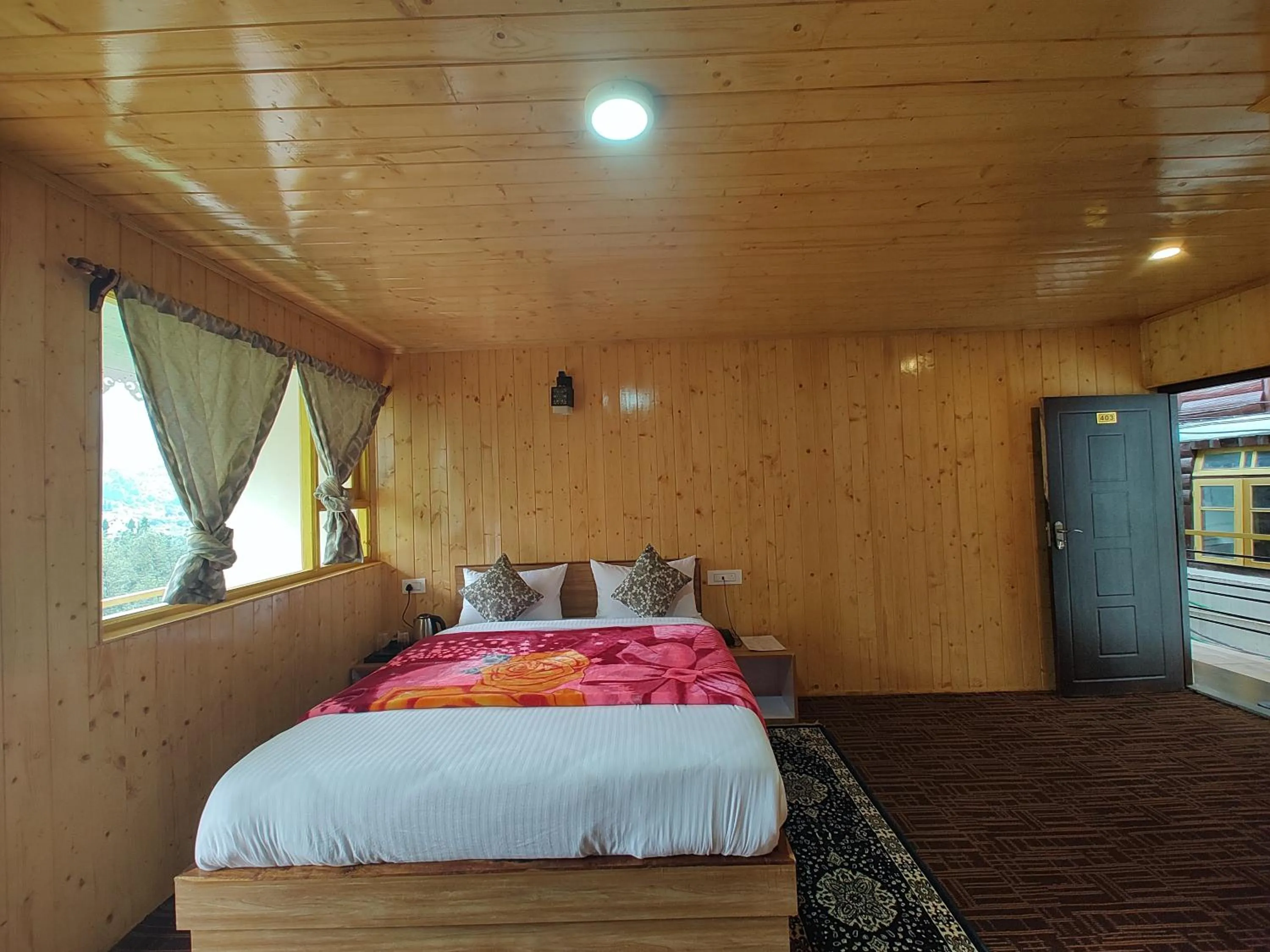 Bedroom in Apple Valley Cottages Lachung