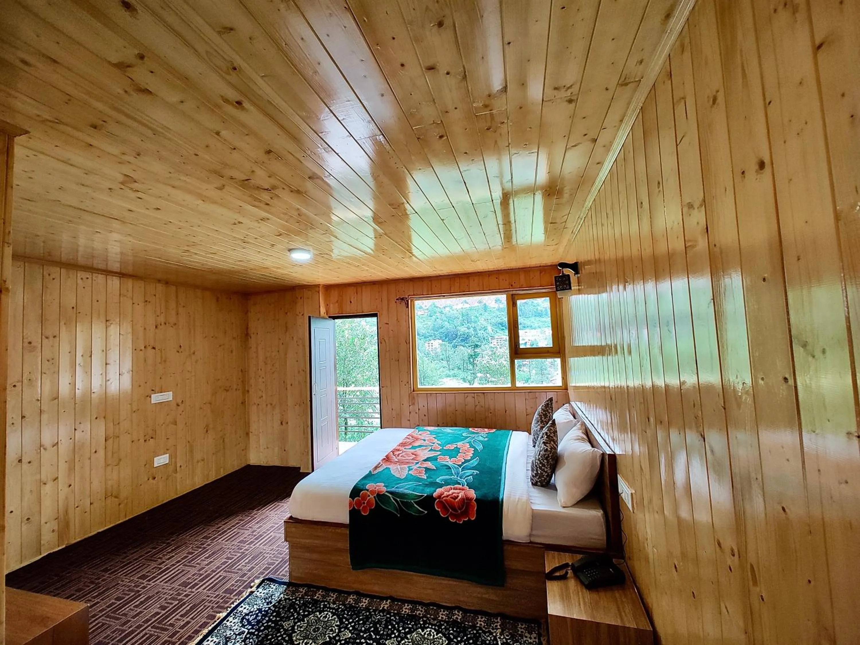 Bedroom in Apple Valley Cottages Lachung