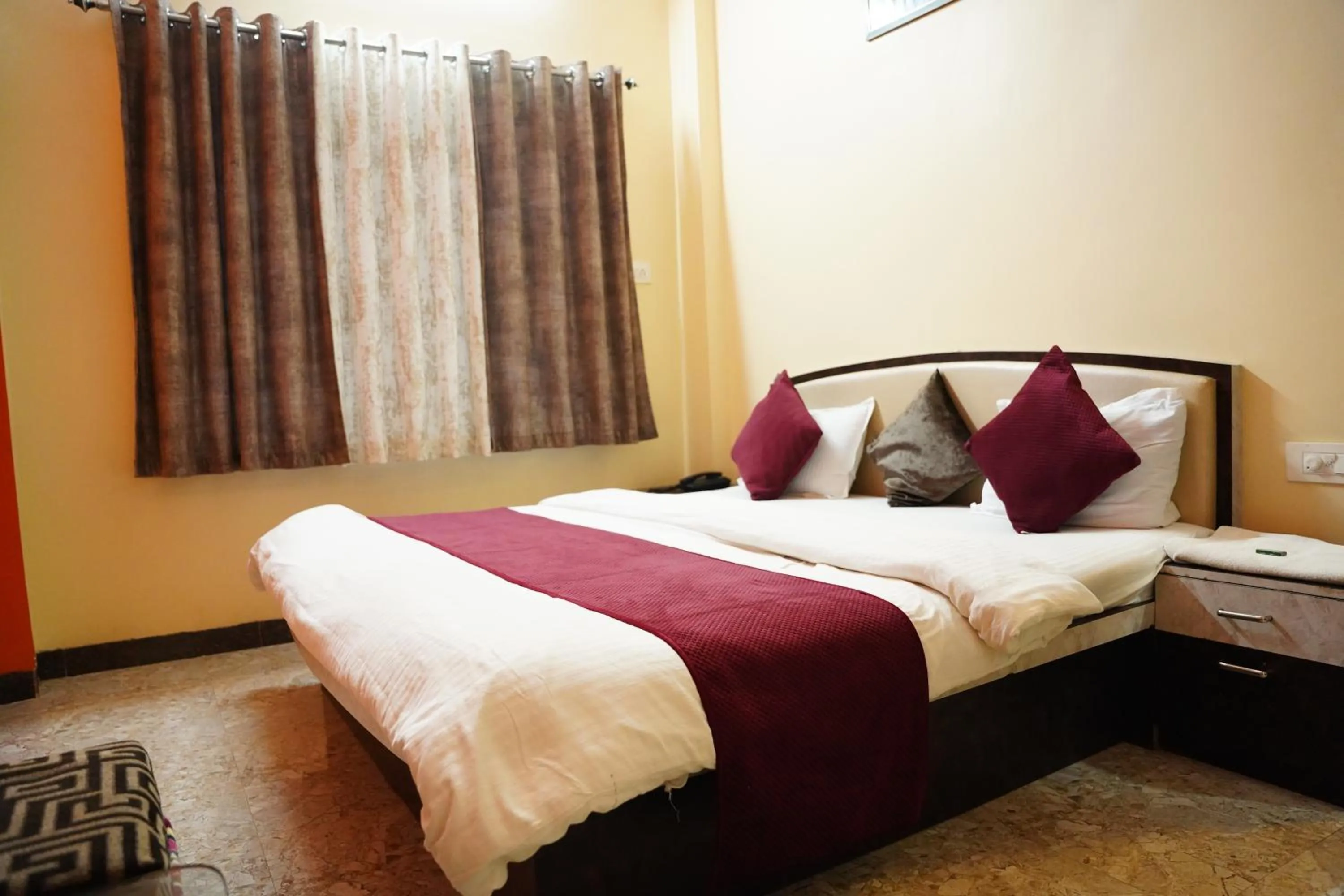 Bed in Hotel Mahishmati Palace