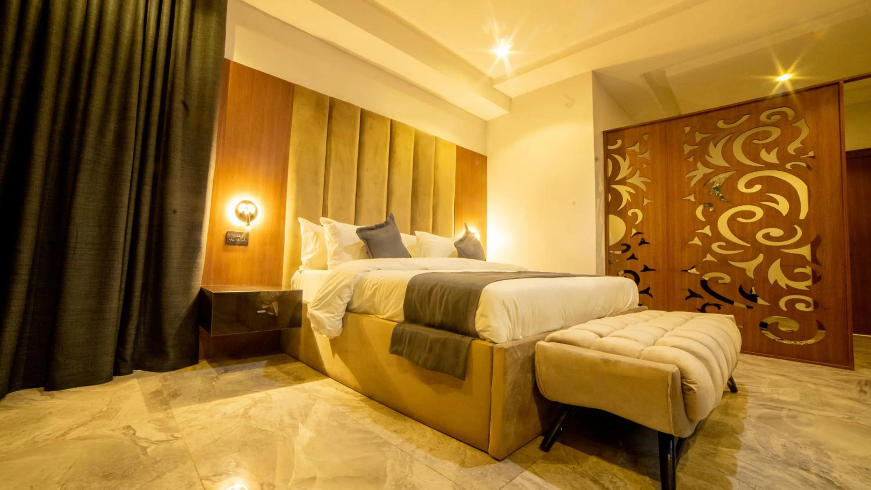 Bed in Tranquila Hotels and Suites Abuja