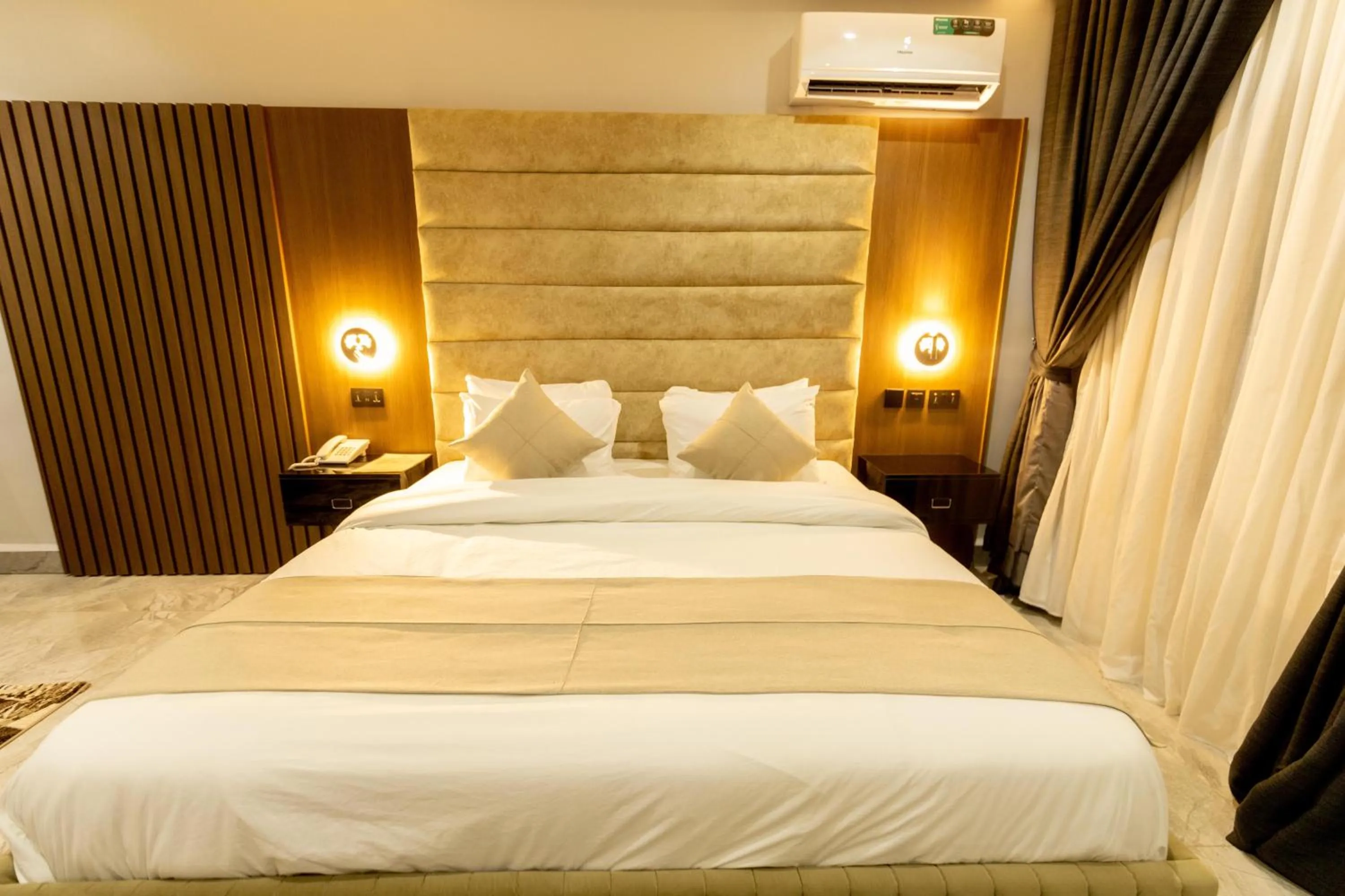 Bed in Tranquila Hotels and Suites Abuja