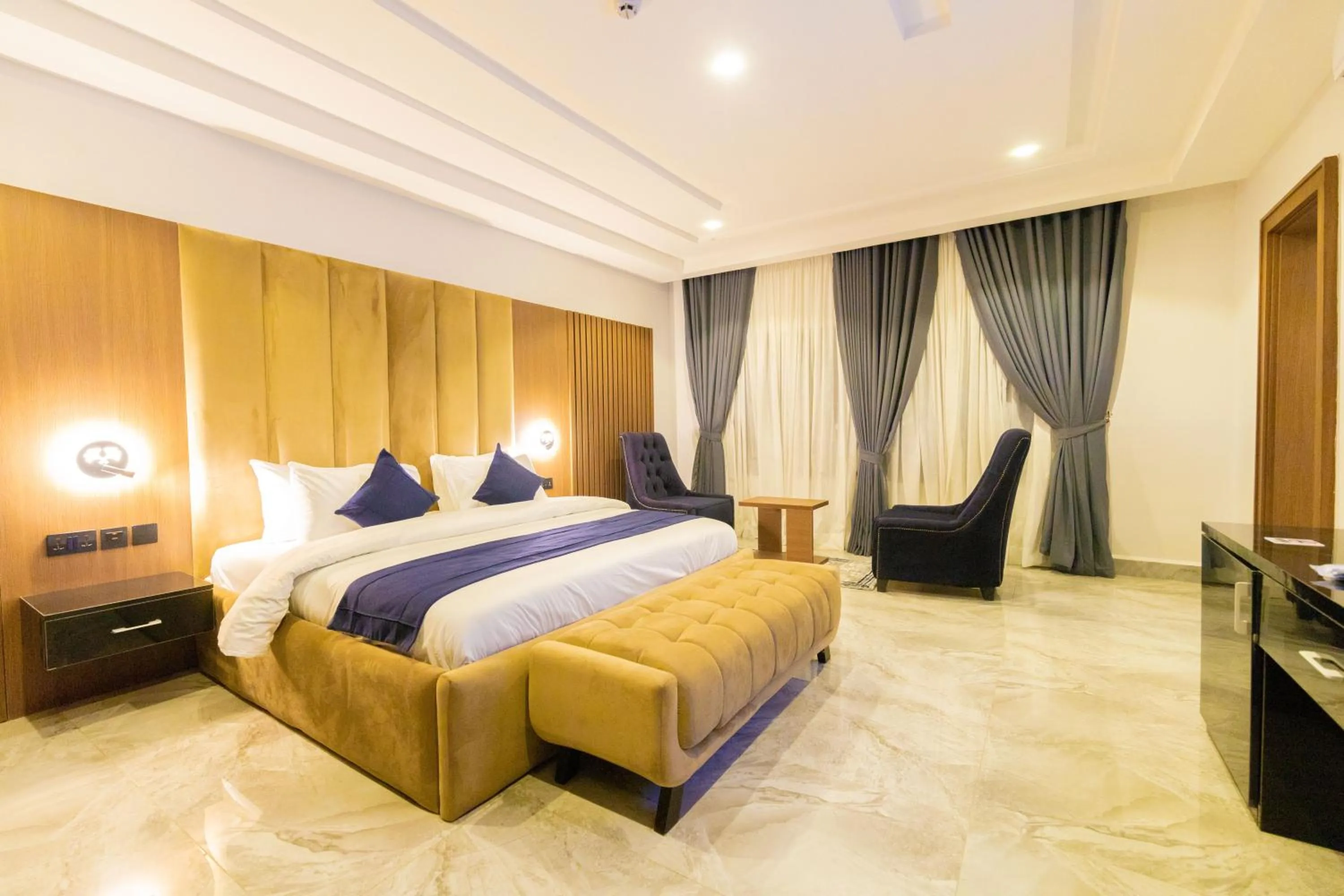 Bed in Tranquila Hotels and Suites Abuja