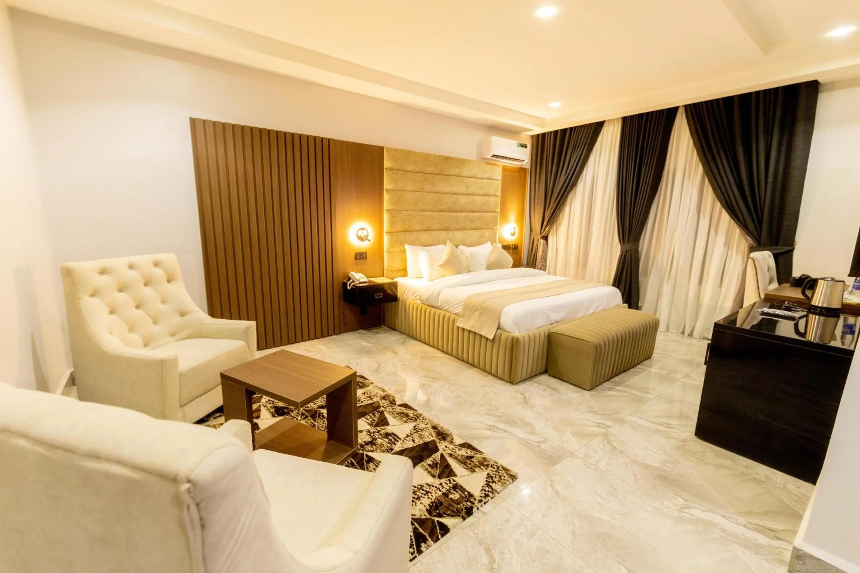 Bed in Tranquila Hotels and Suites Abuja
