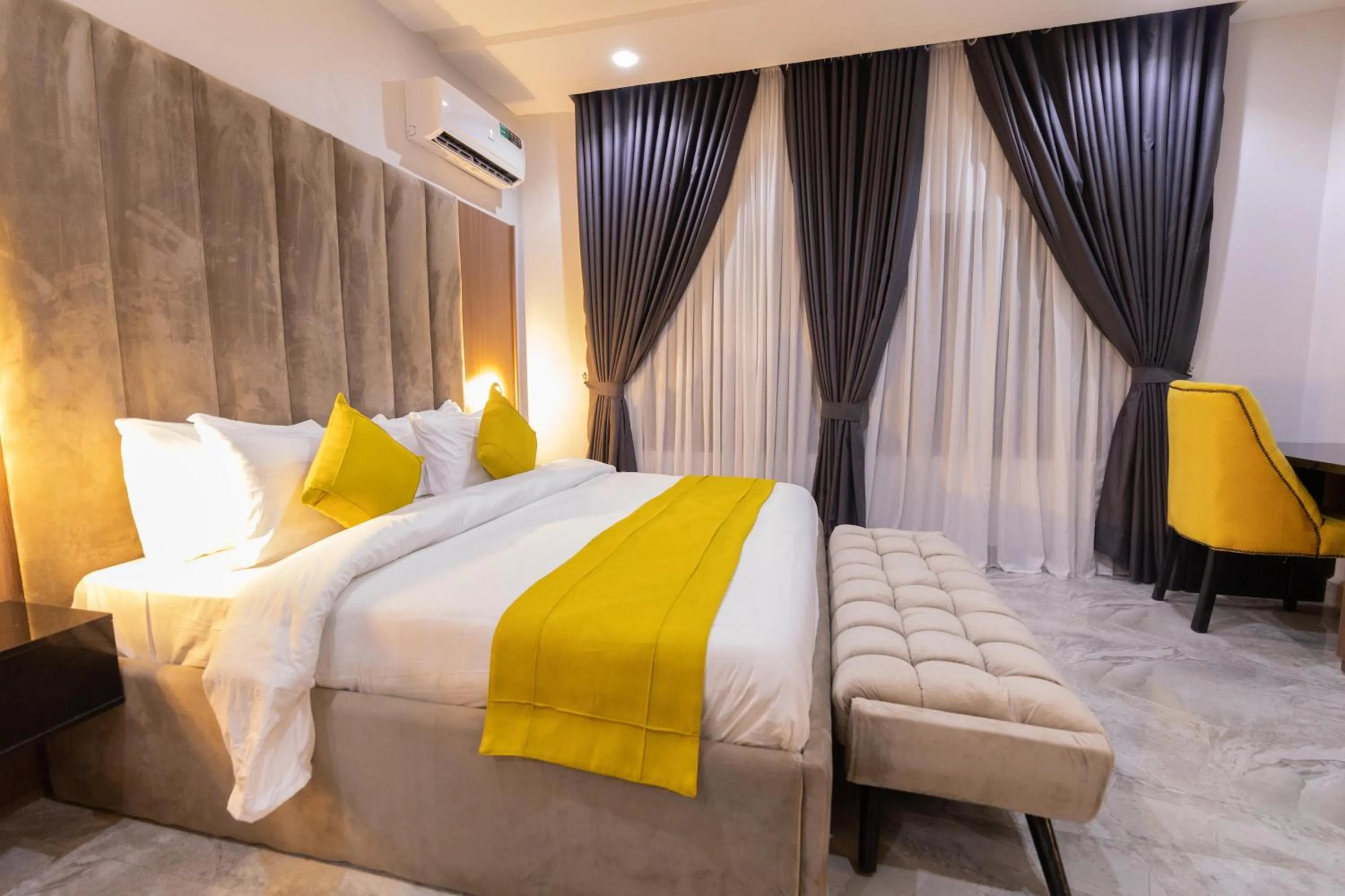 Bed in Tranquila Hotels and Suites Abuja