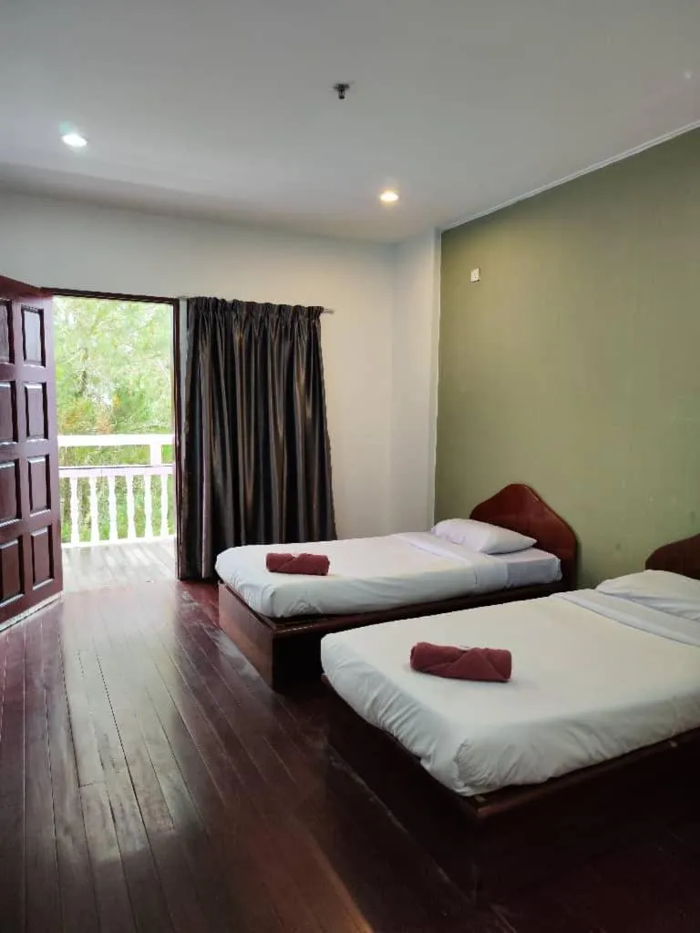 Bed in Fairy Garden Resort Kundasang