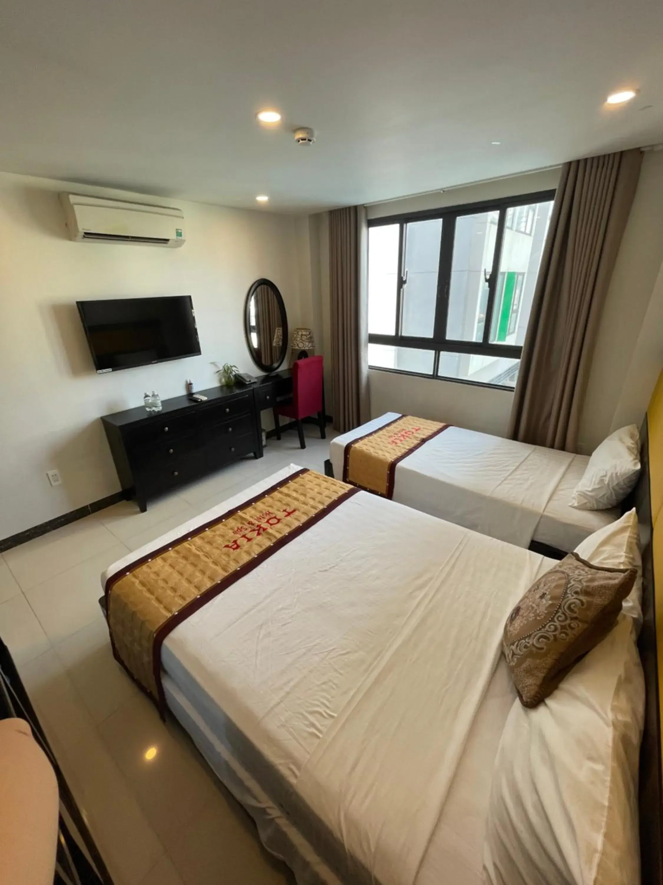 Basic Triple Room in Tokia hotel nha trang Basic Triple Room in Tokia hotel nha trang