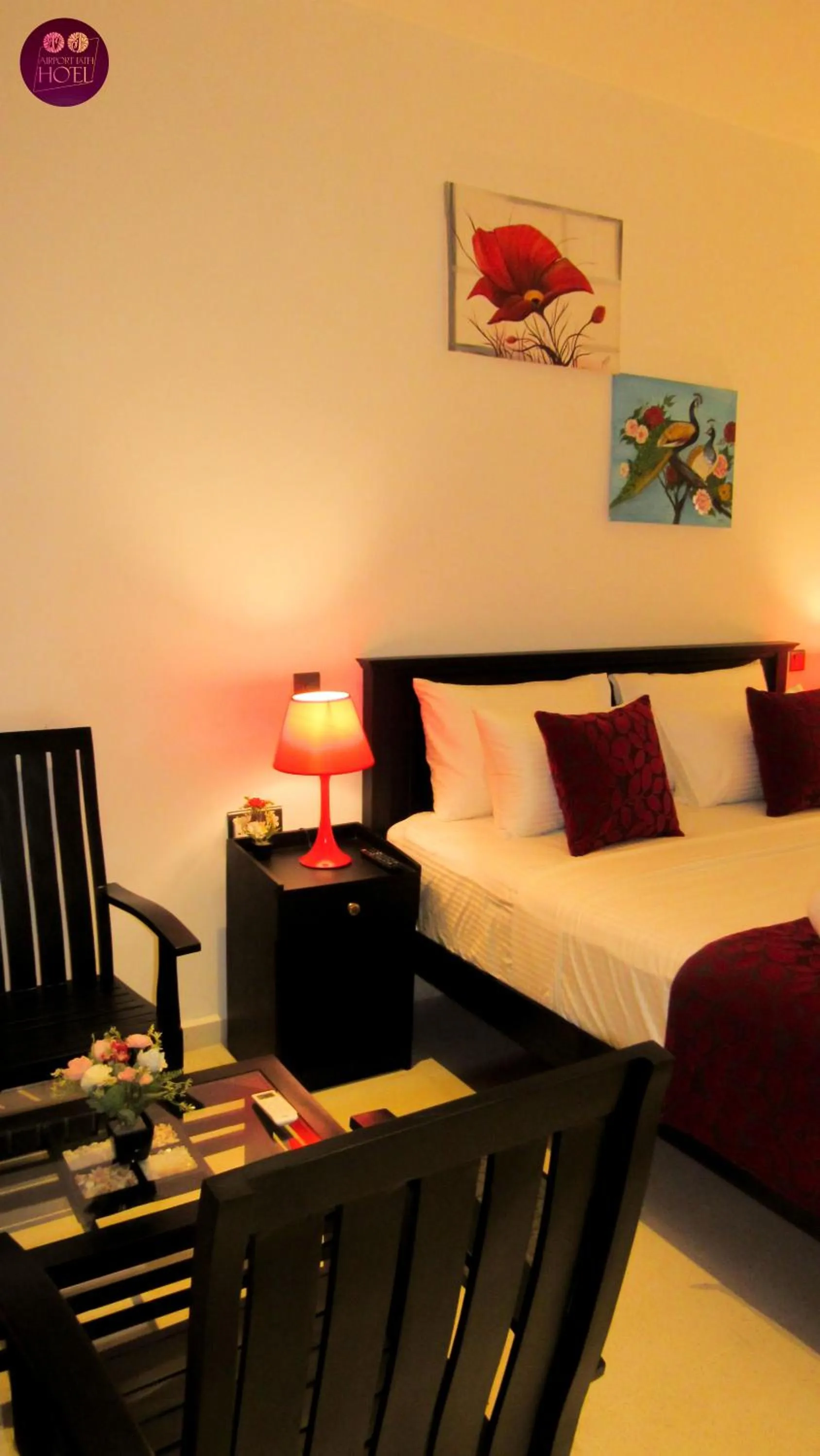 Living room, Bed in Airport Faith Hotel