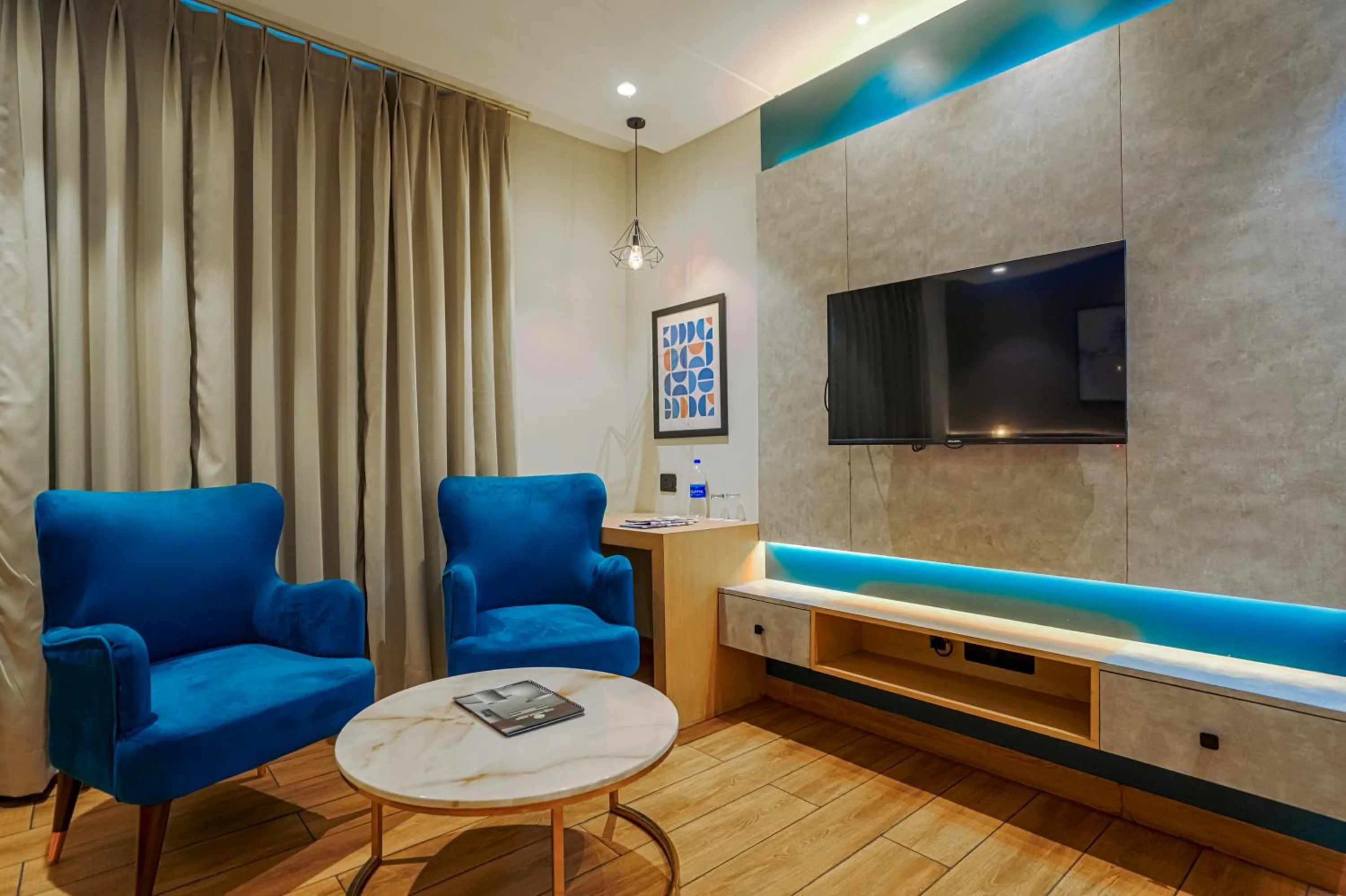 TV and multimedia in Hotel Highway Greens Near VR Punjab Mall Airport Road Mohali Chandigarh