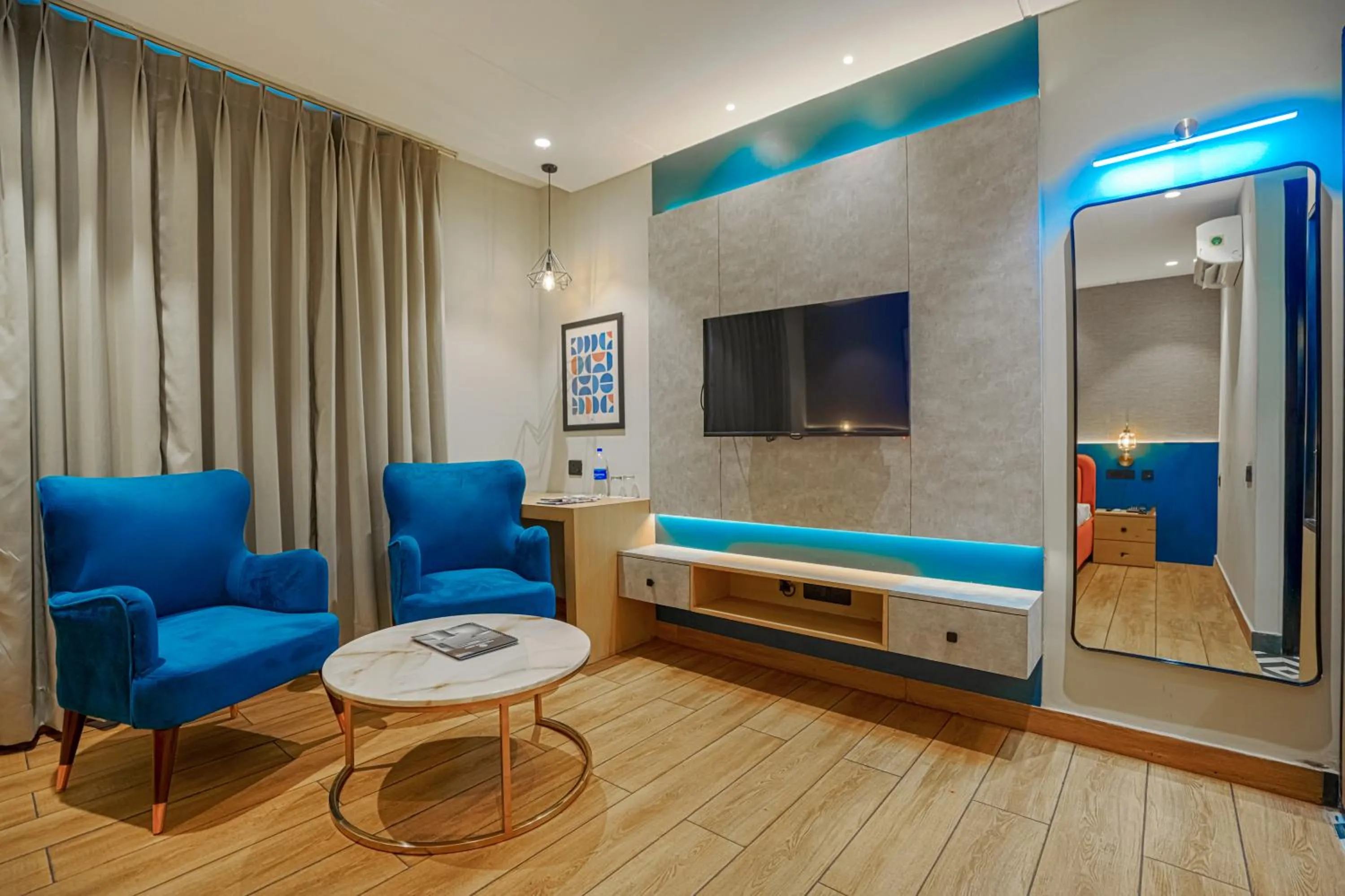 TV and multimedia in Hotel Highway Greens Near VR Punjab Mall Airport Road Mohali Chandigarh