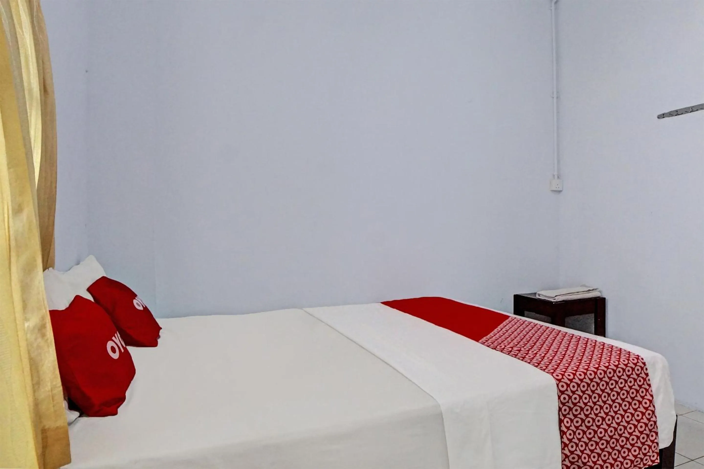 Bedroom in Hotel O Vania Guest HouseNearRSUP H Adam Malik