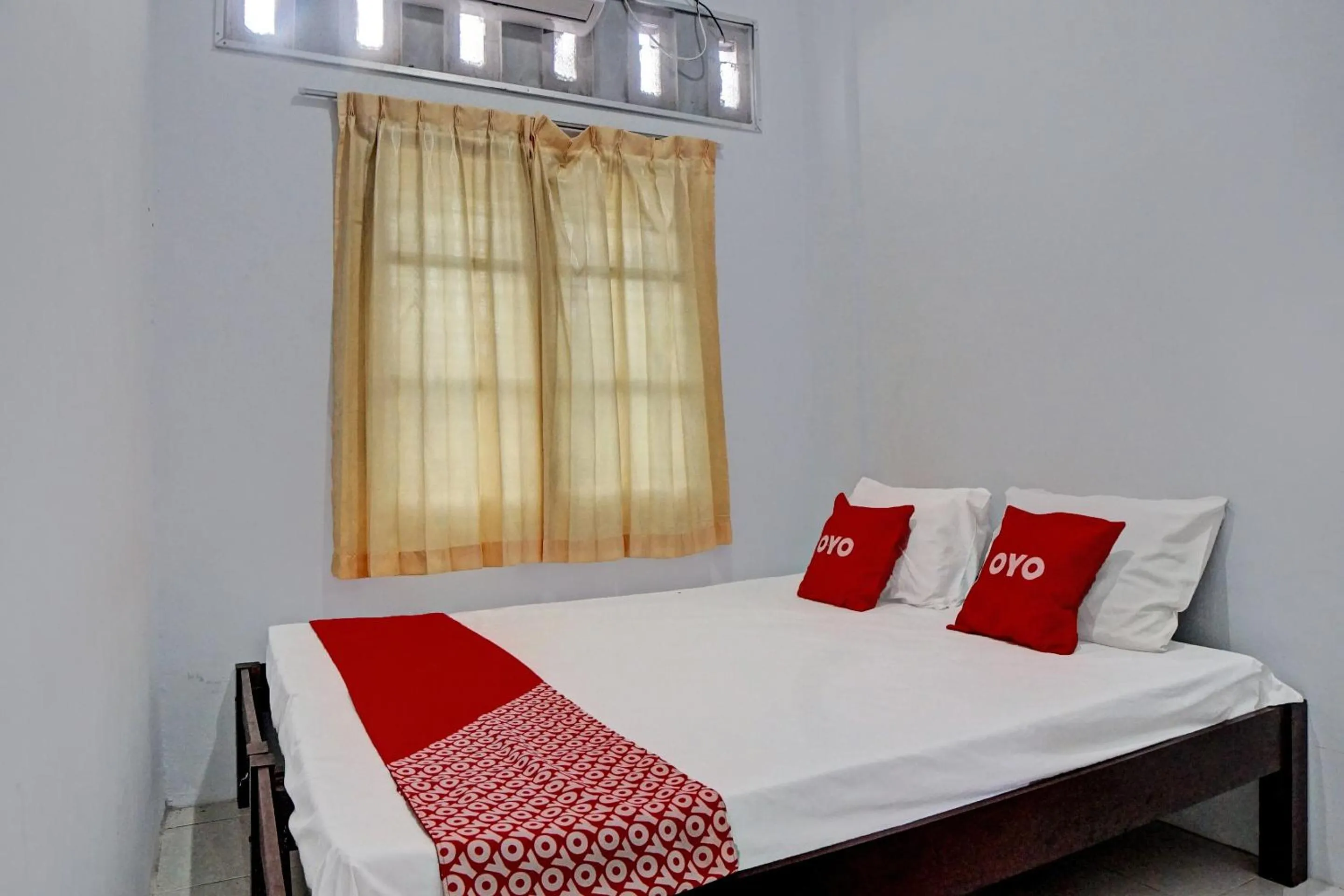 Bedroom in Hotel O Vania Guest HouseNearRSUP H Adam Malik