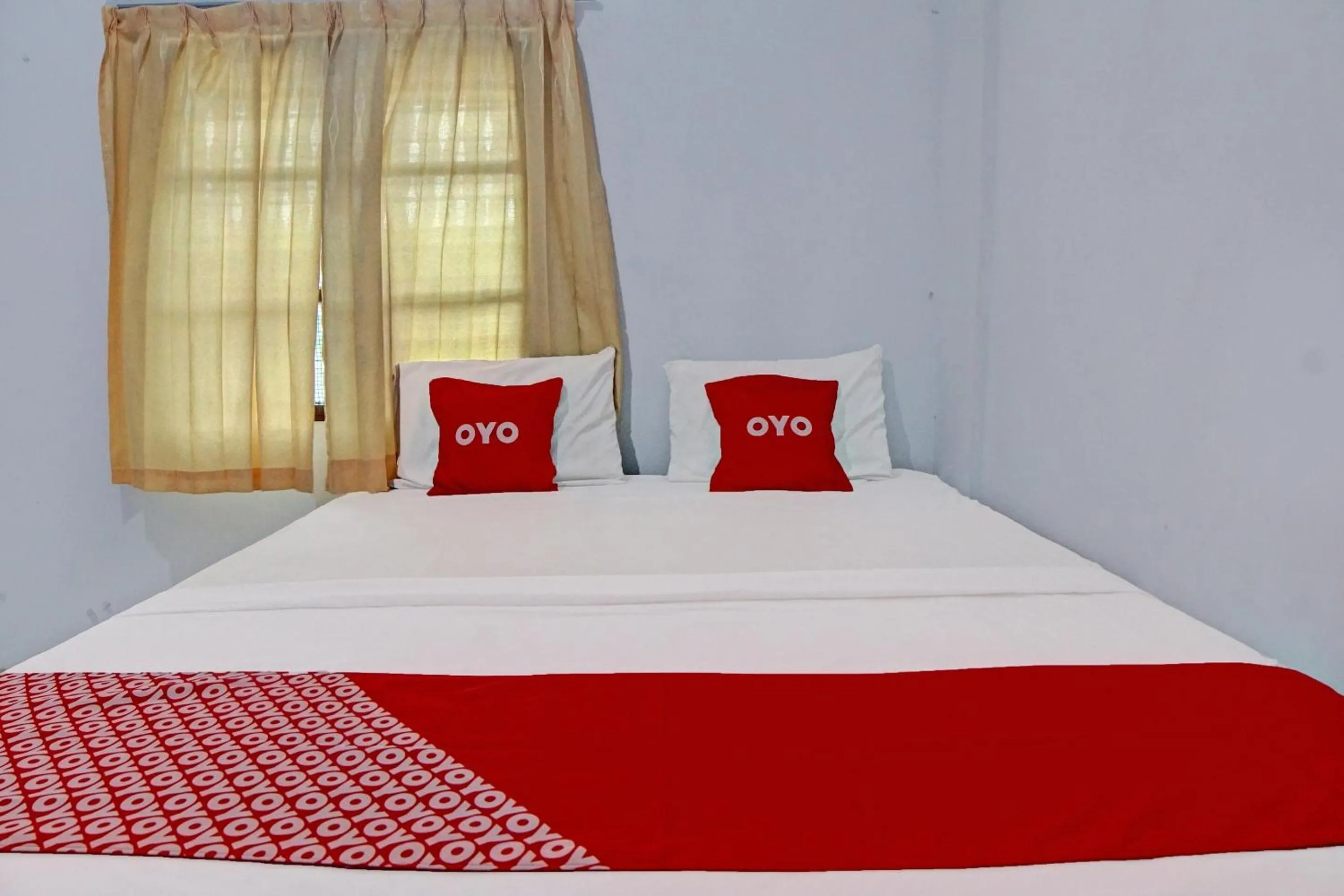 Bedroom in Hotel O Vania Guest HouseNearRSUP H Adam Malik