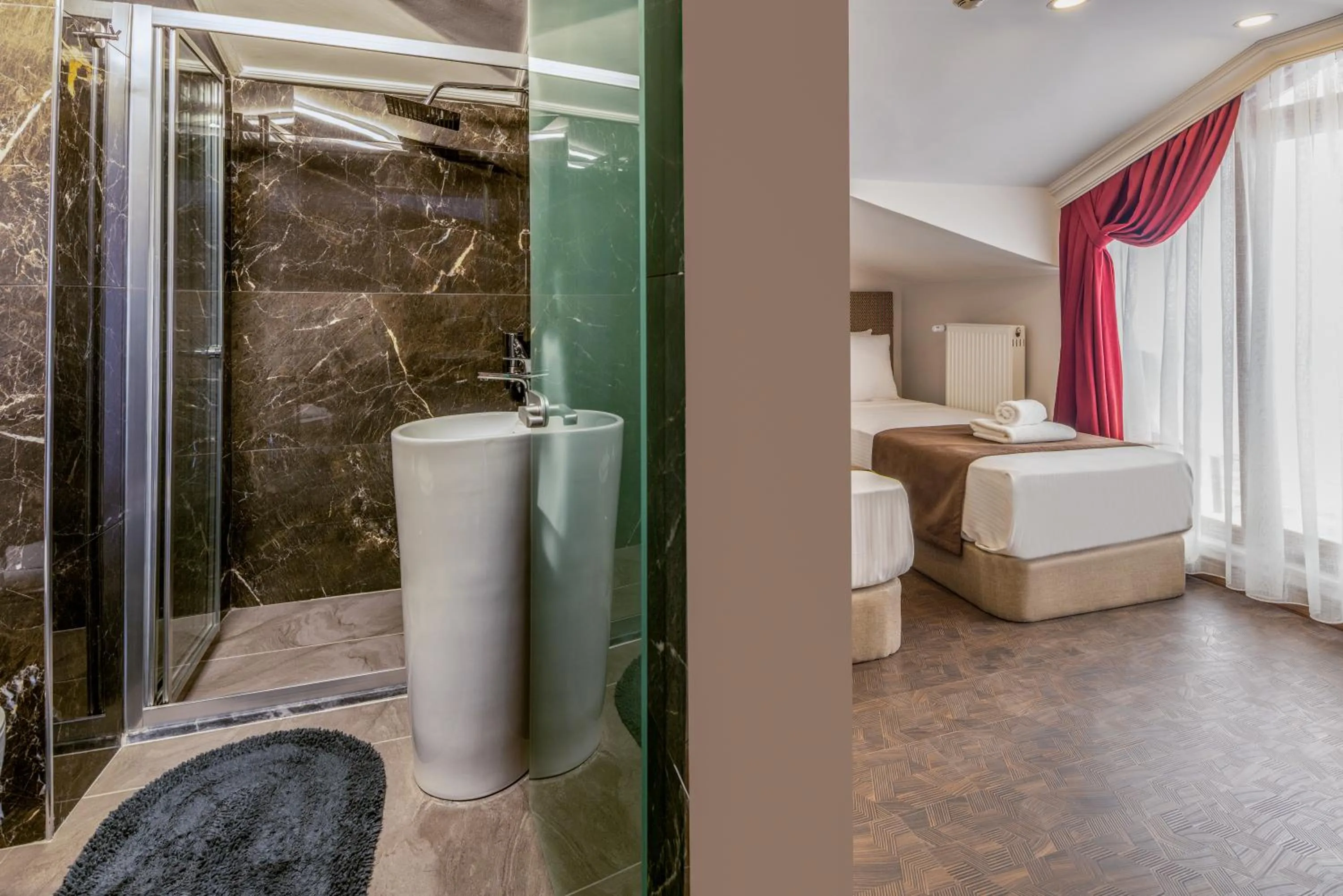 Shower, Bed in Baymari Suites Design Florya