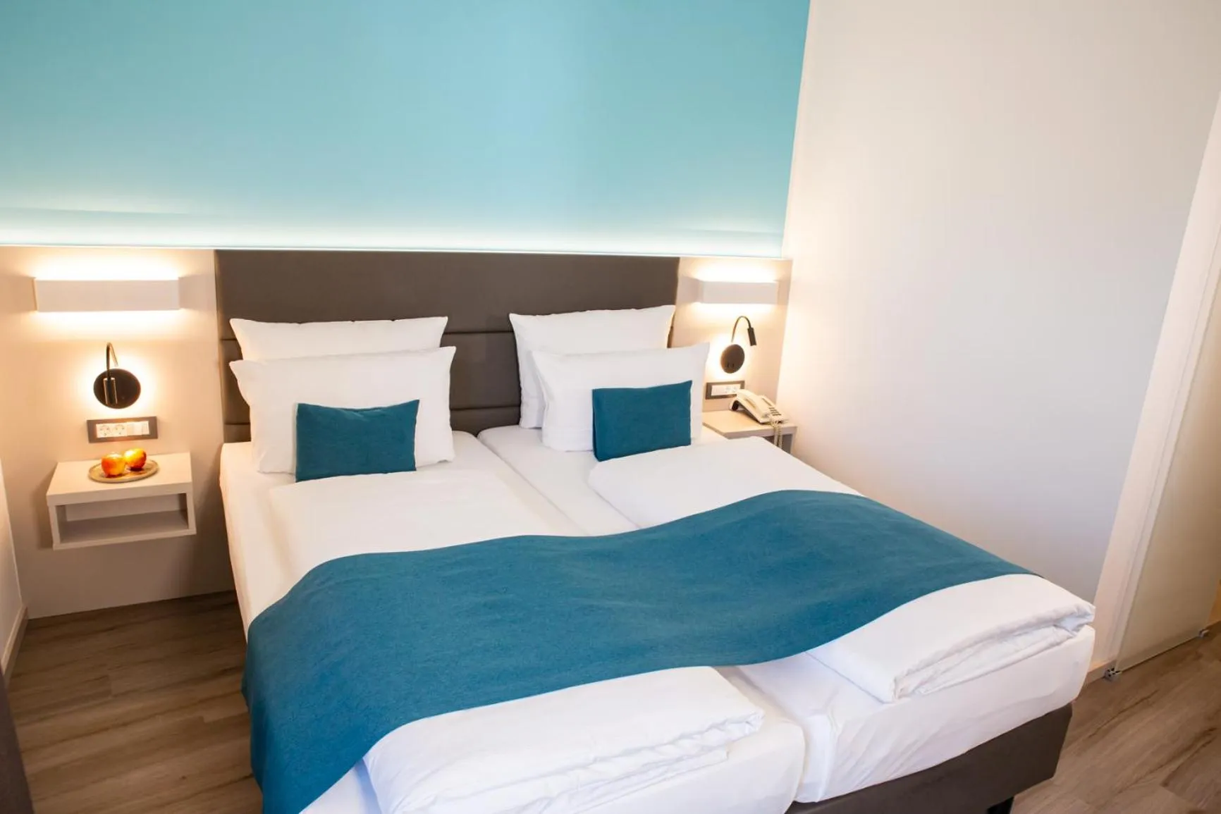 Bed in Hotel Kapuzinerhof