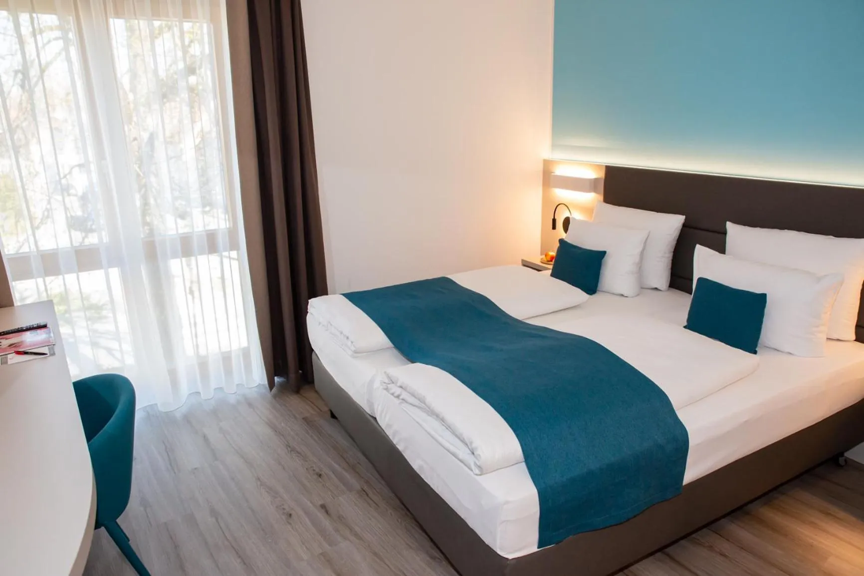 Bed in Hotel Kapuzinerhof