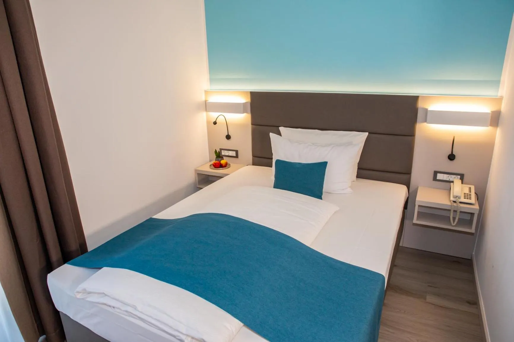 Bed in Hotel Kapuzinerhof