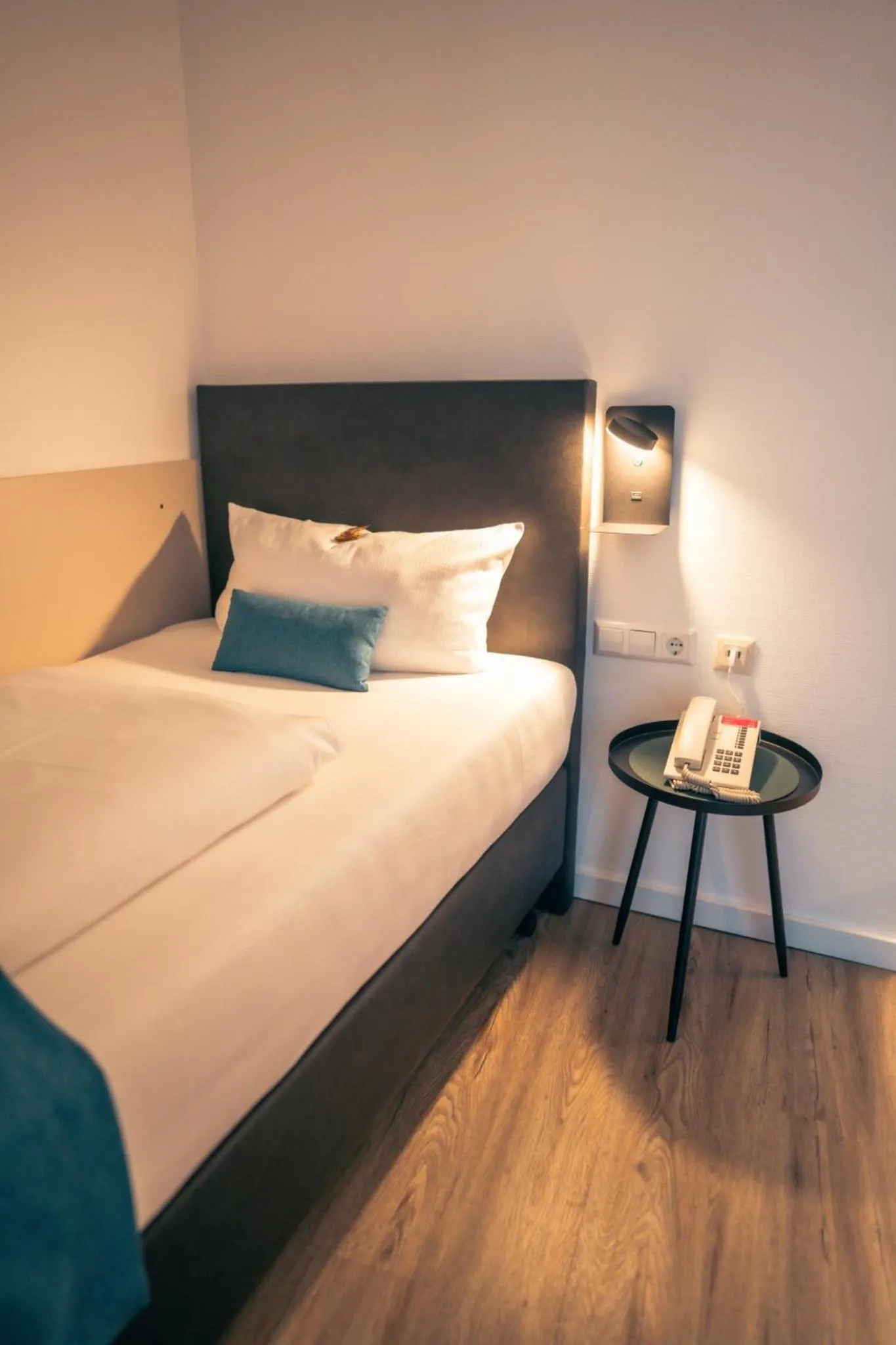 Bed in Hotel Kapuzinerhof