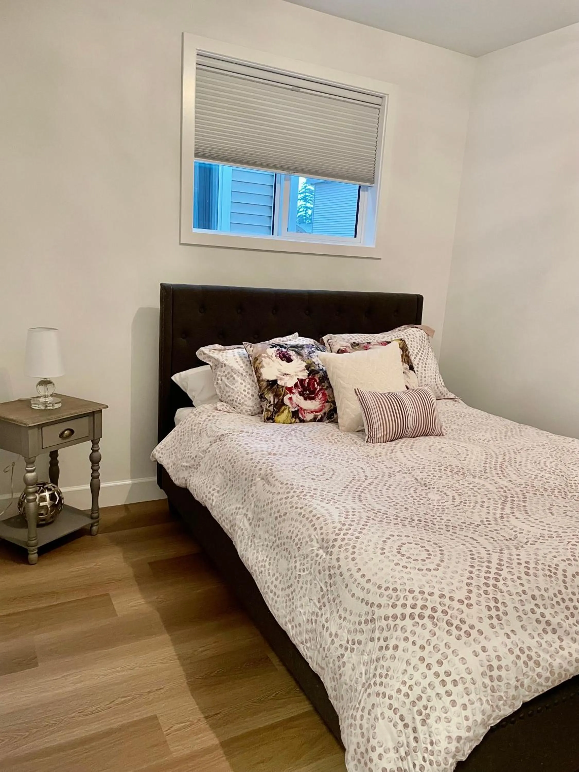 Bed in Adorable 1 Bedroom Suite- a skip to Galloping Goose