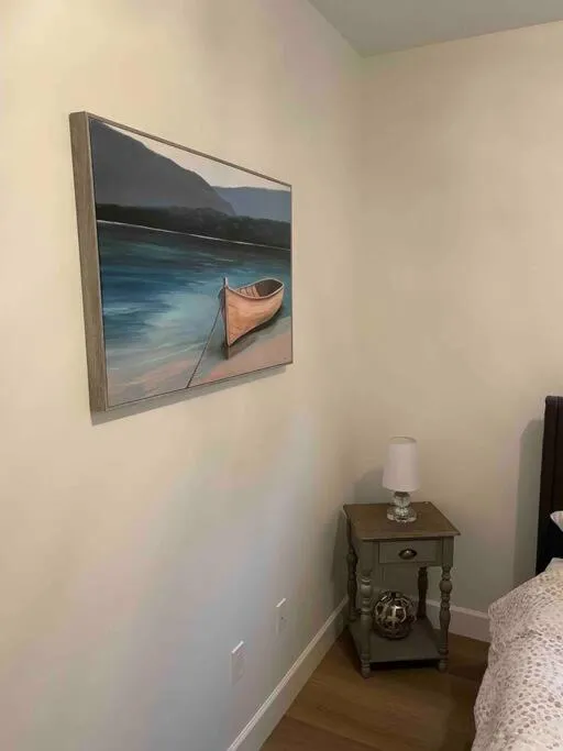 Bed in Adorable 1 Bedroom Suite- a skip to Galloping Goose