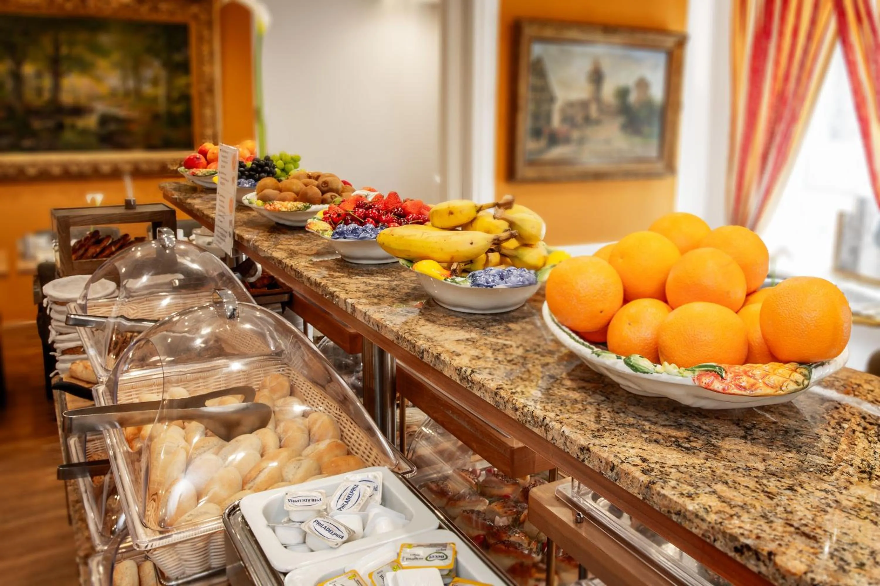 Buffet breakfast in TIPTOP Hotel Burgschmiet Garni