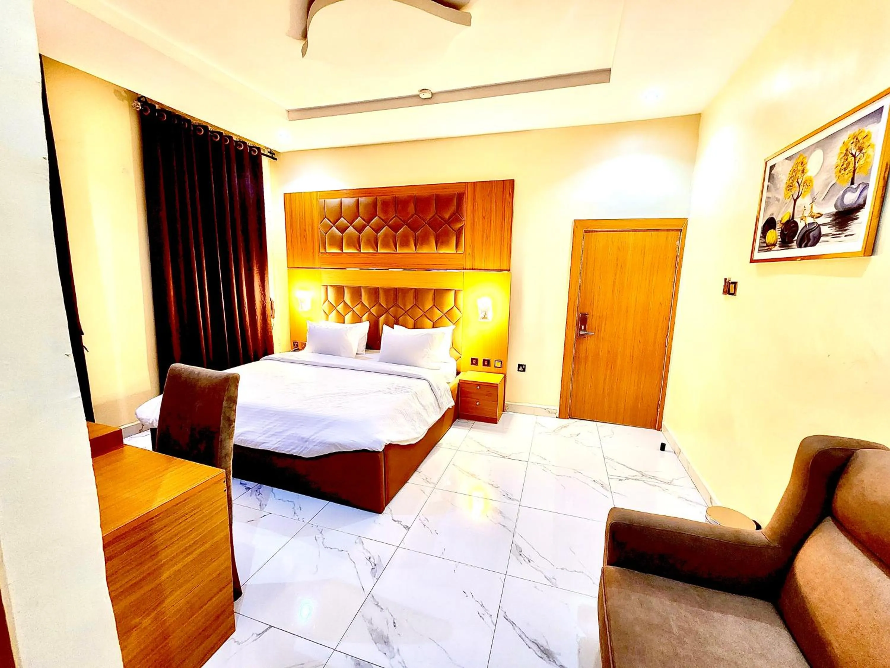 Bed in Buddiez Hotel & Resort