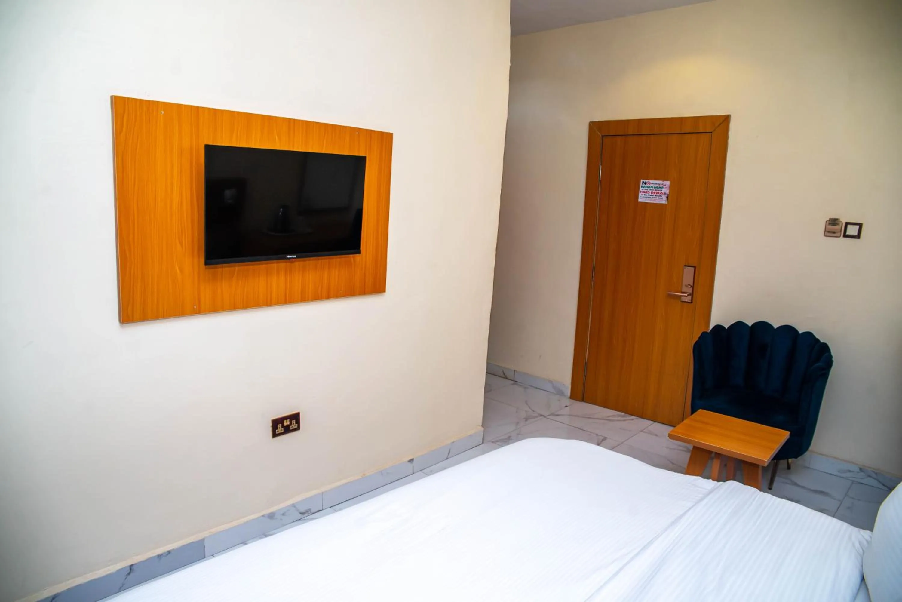 Bed in Buddiez Hotel & Resort