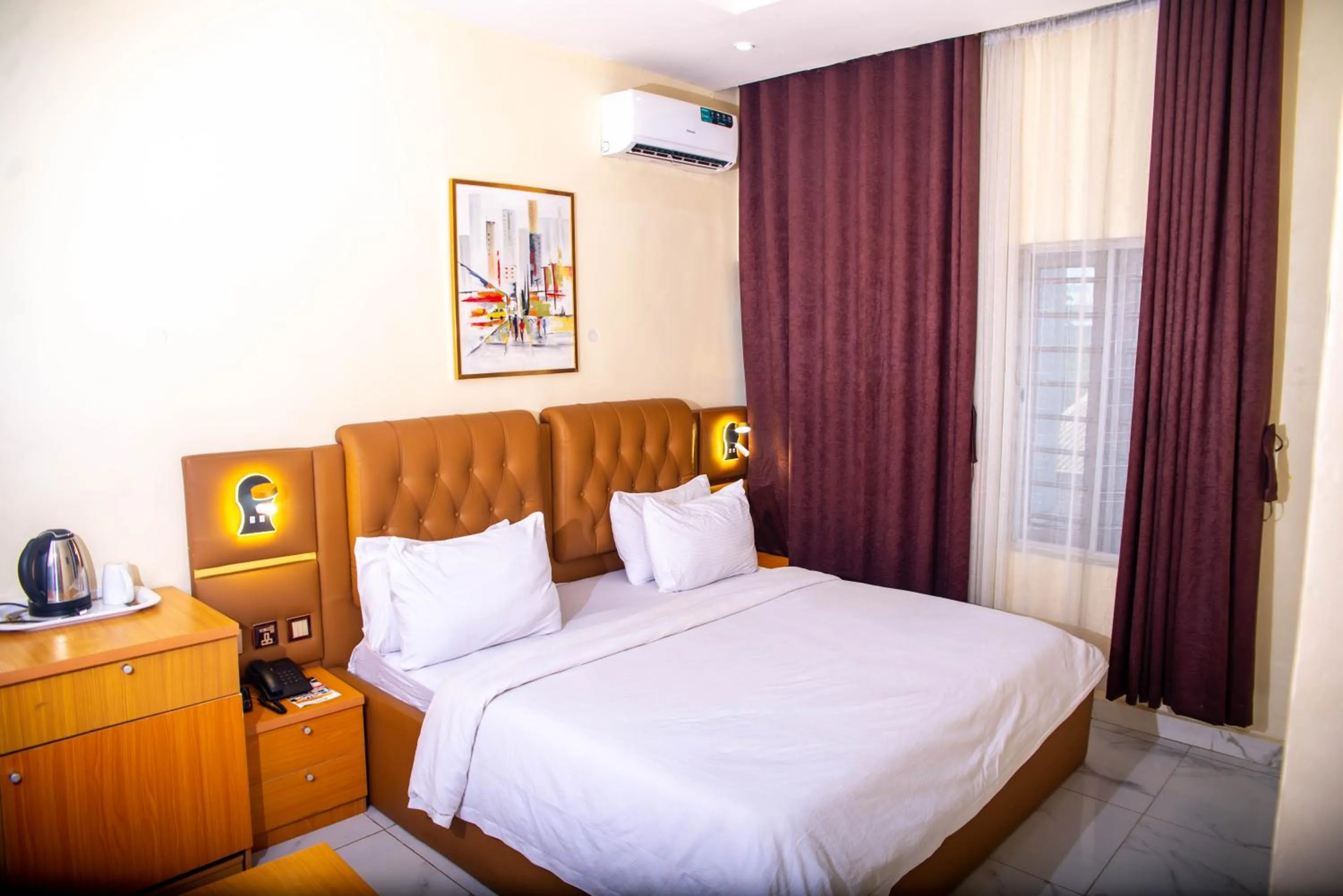 Bed in Buddiez Hotel & Resort