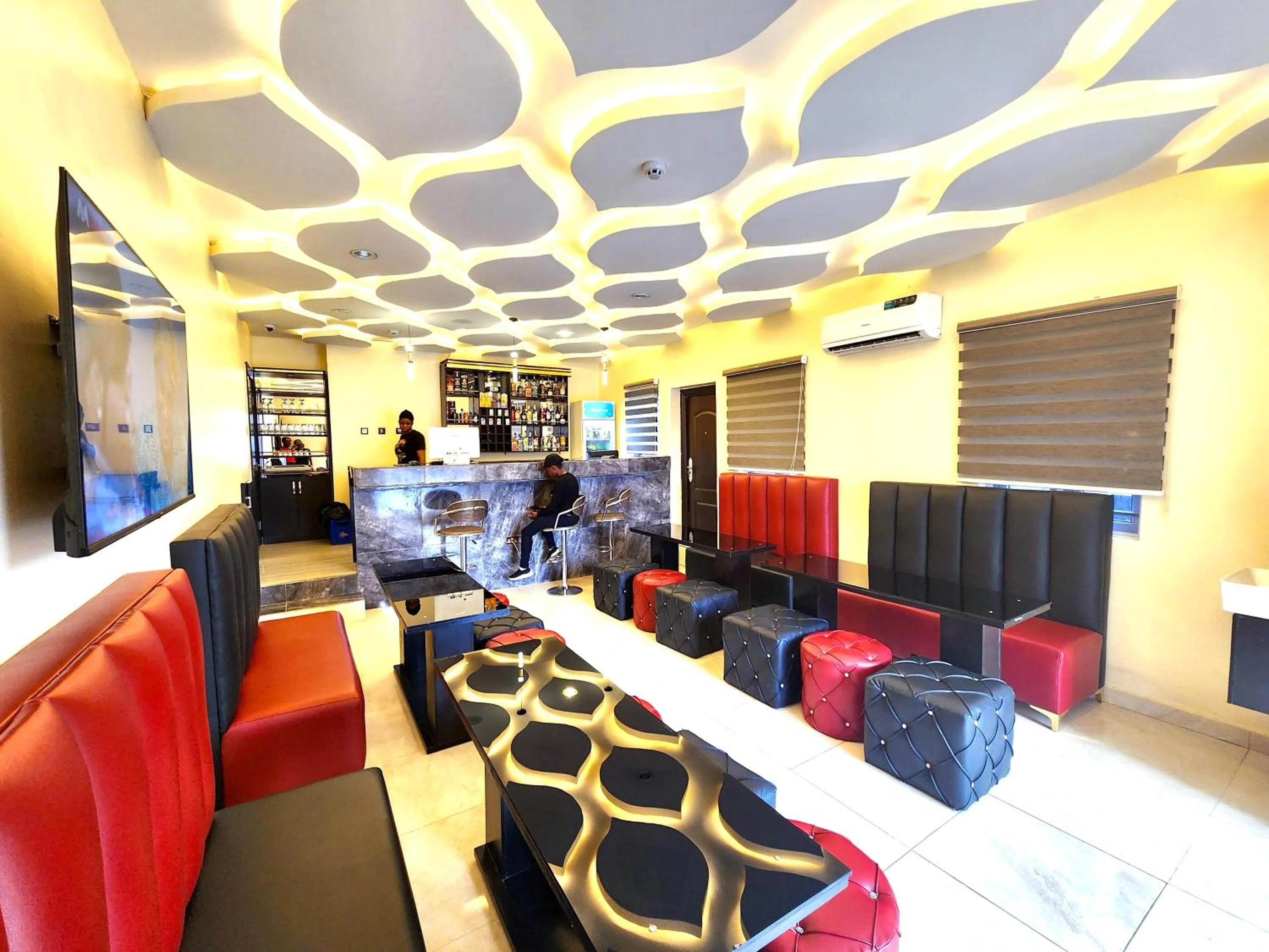 Communal lounge/ TV room in Buddiez Hotel & Resort