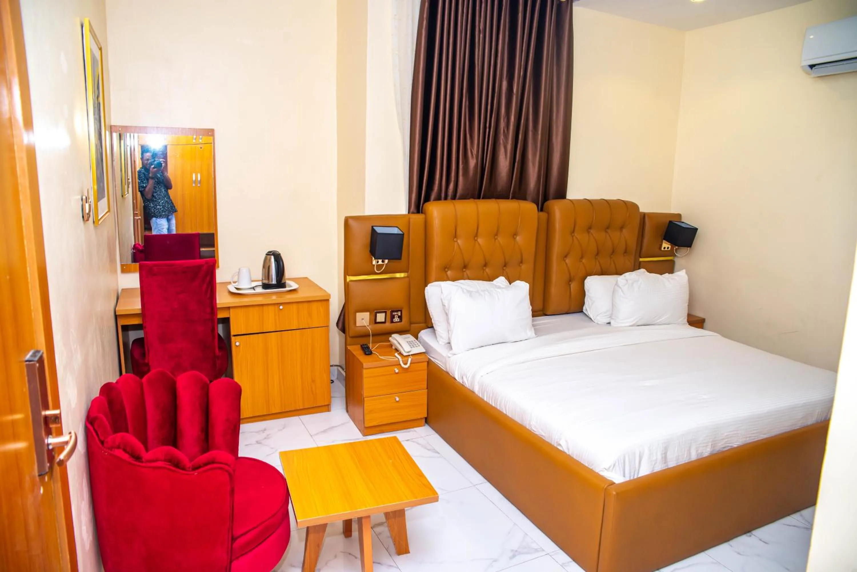 Bed in Buddiez Hotel & Resort