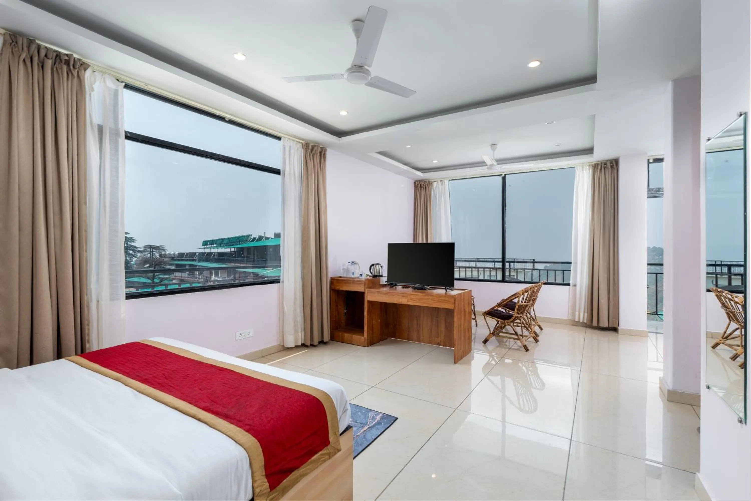 Living room, Bed in Hotel Buddha's Abode- Best Hotel in McleodGanj Main Market