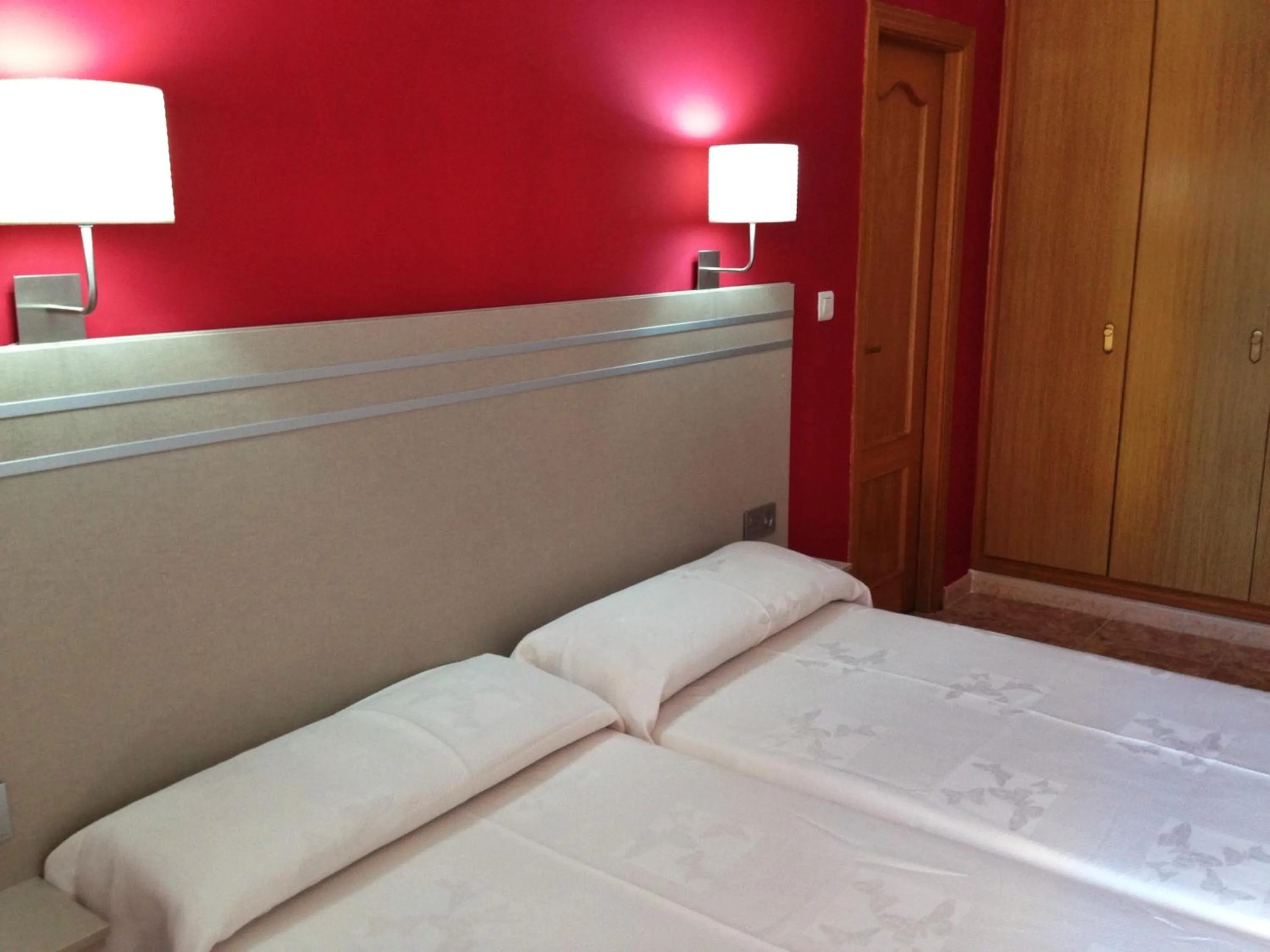 Bed in Hotel Carmen Teresa