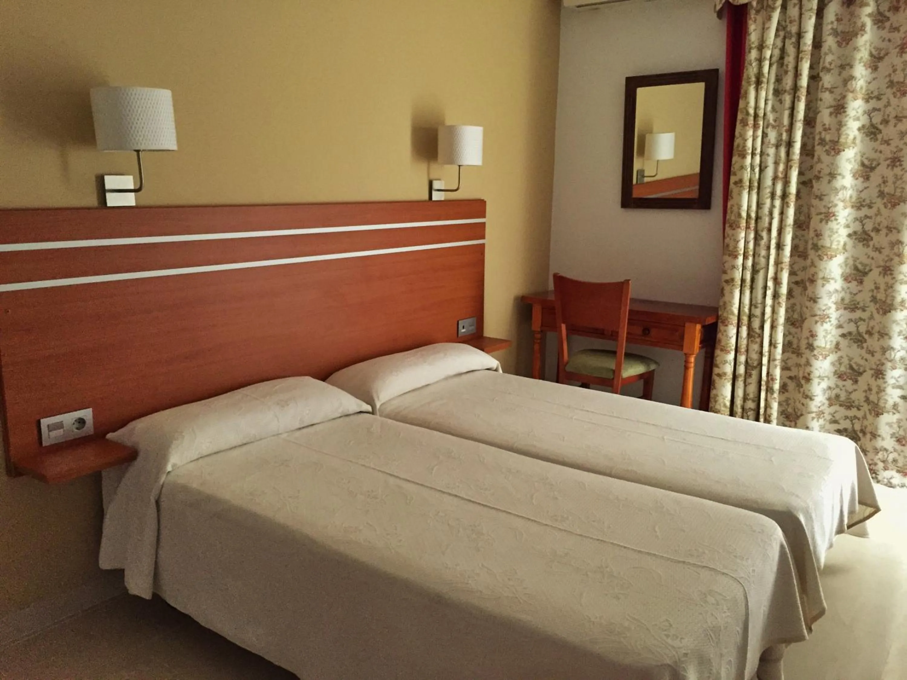 Bed in Hotel Carmen Teresa