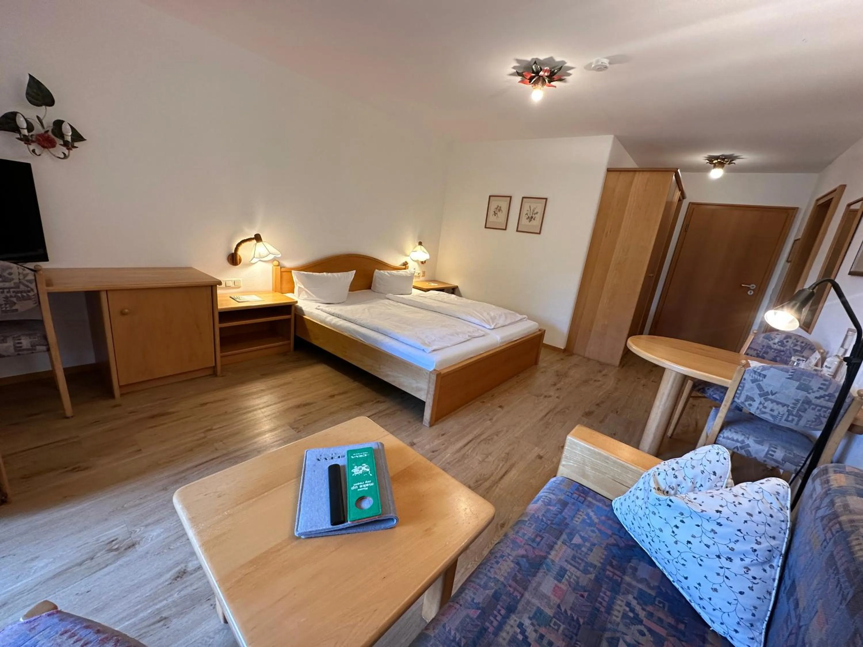 Photo of the whole room, Bed in Landhotel Maiergschwendt inkl Chiemgaukarte