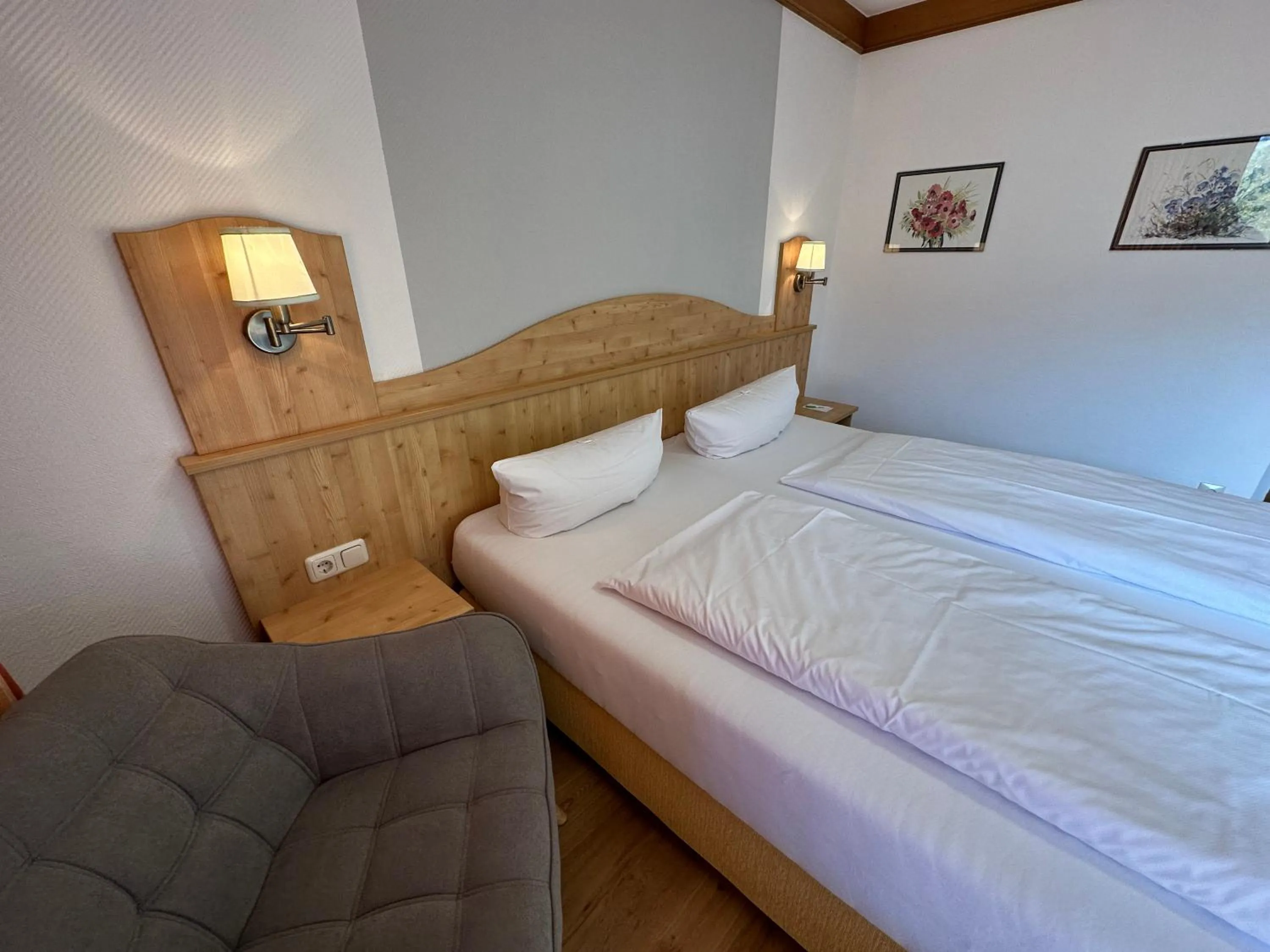 Photo of the whole room, Bed in Landhotel Maiergschwendt inkl Chiemgaukarte