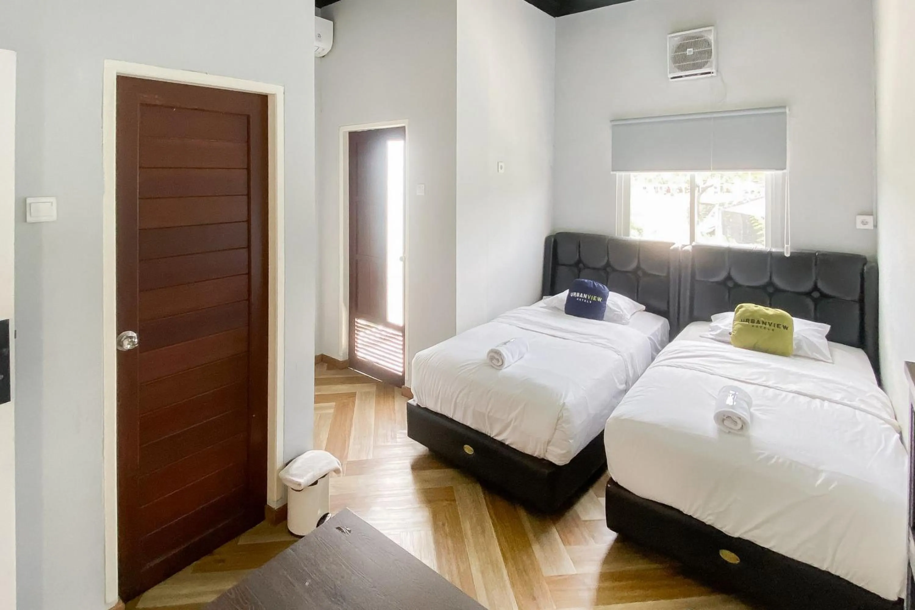 Bedroom, Bed in Urbanview Hotel The Tang Balikpapan by RedDoorz